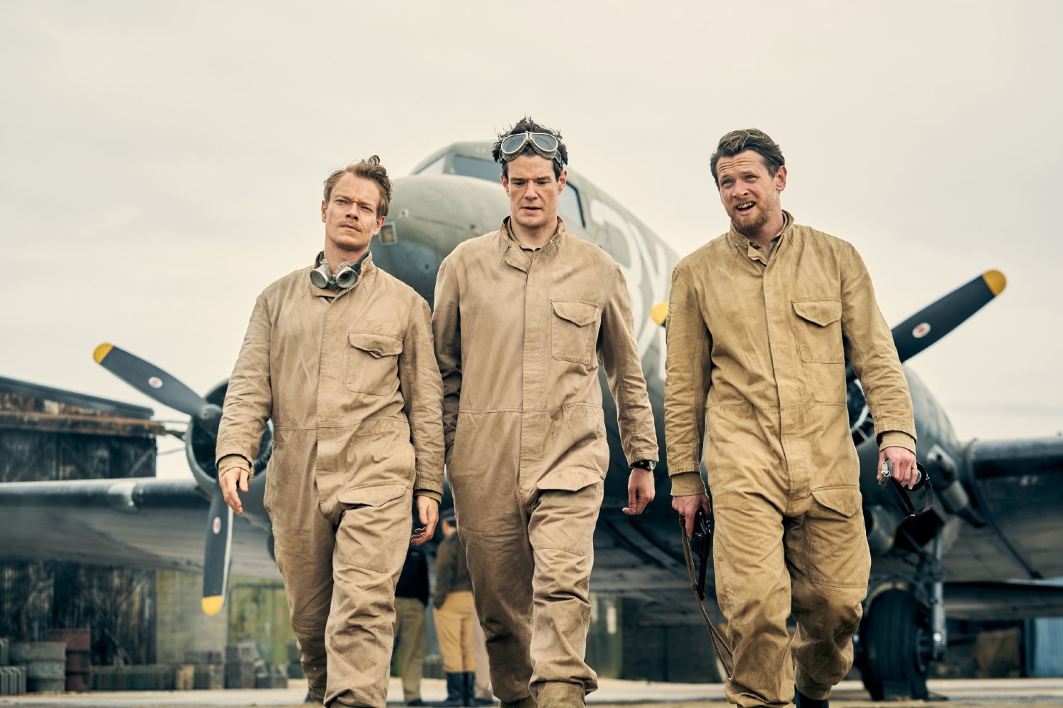 Alfie Allen, Connor Swindells and Jack O'Connell in overalls in SAS Rogue Heroes