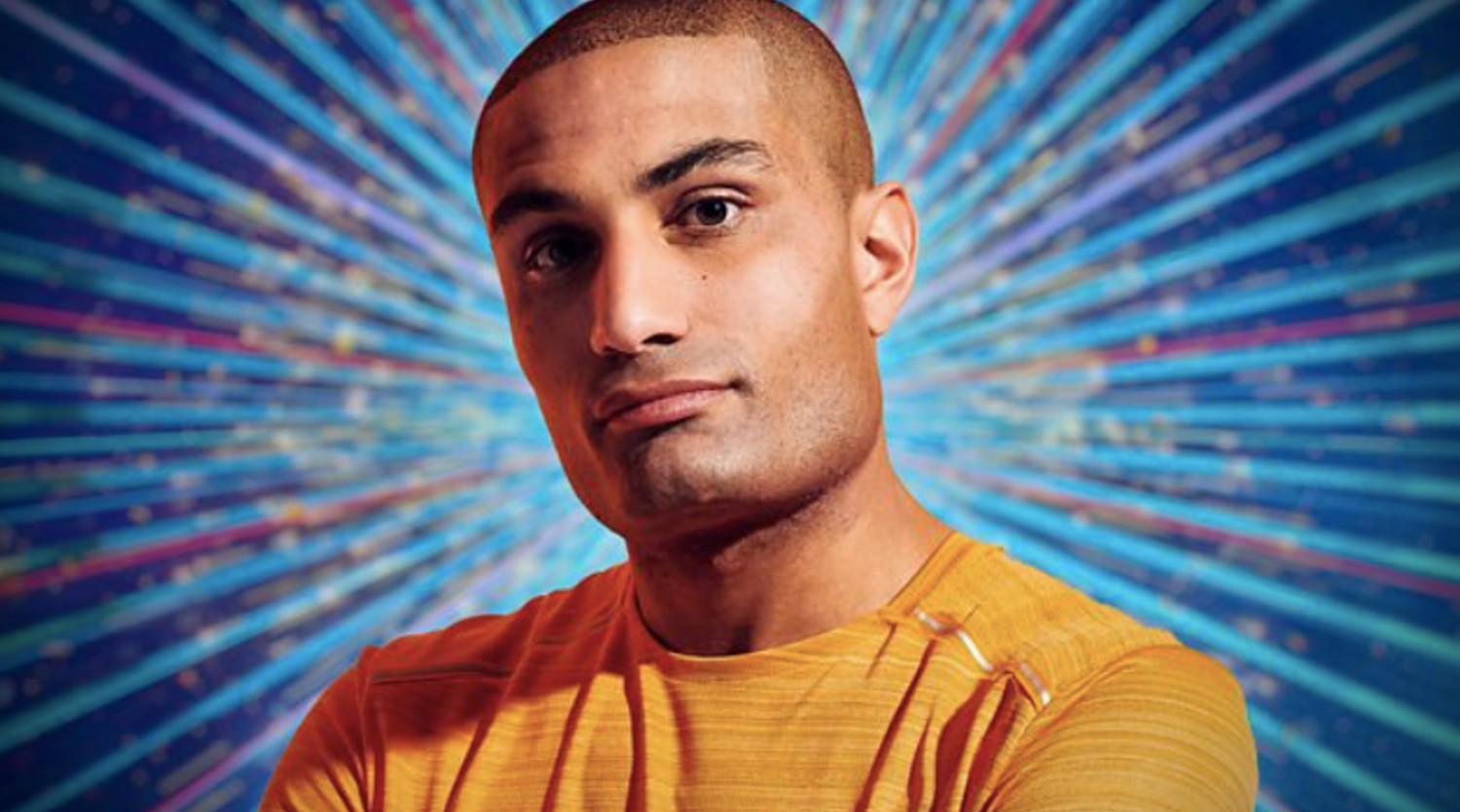 Richie Anderson wearing an orange top on Strictly