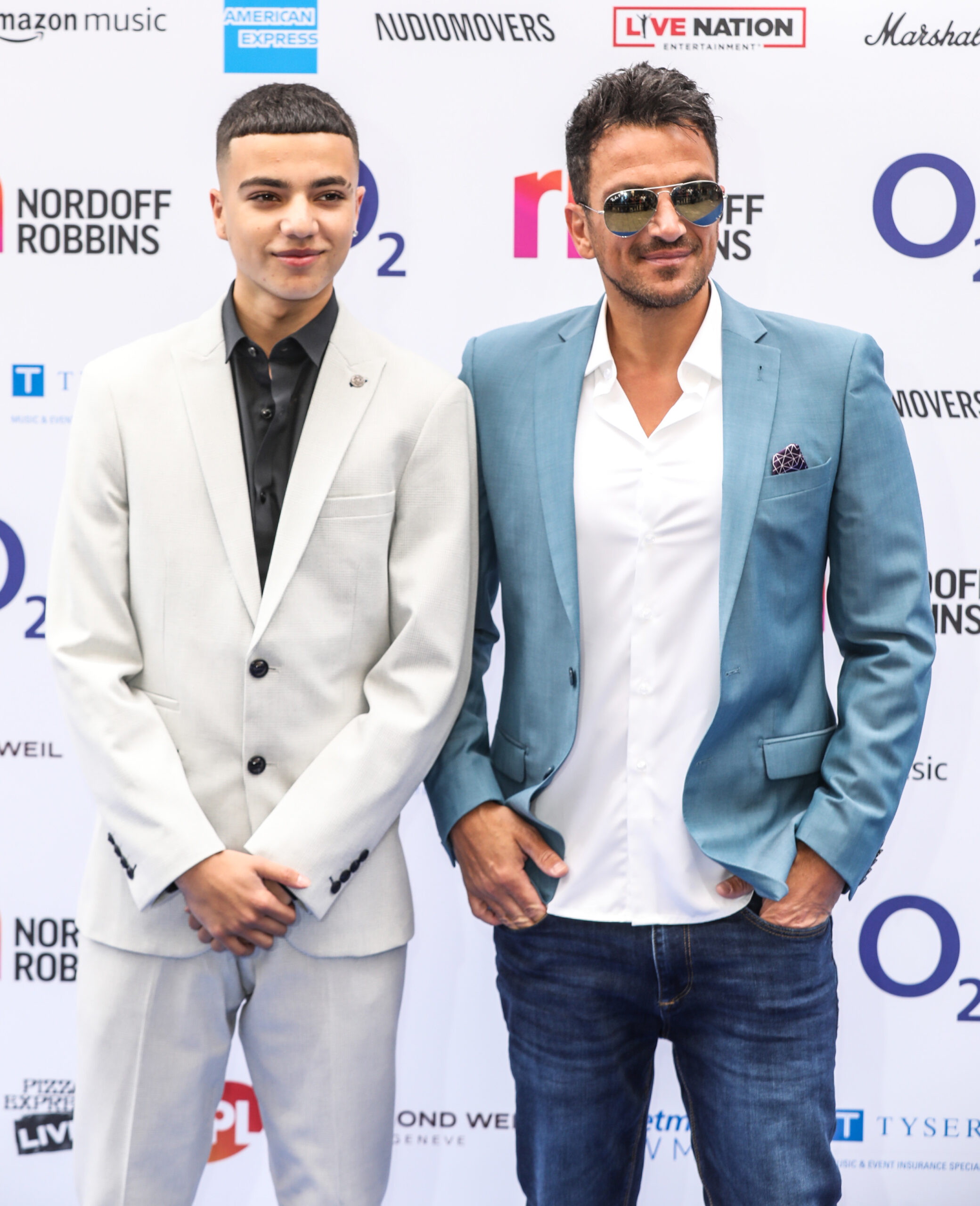 Peter Andre posing with his son, Junior Andre