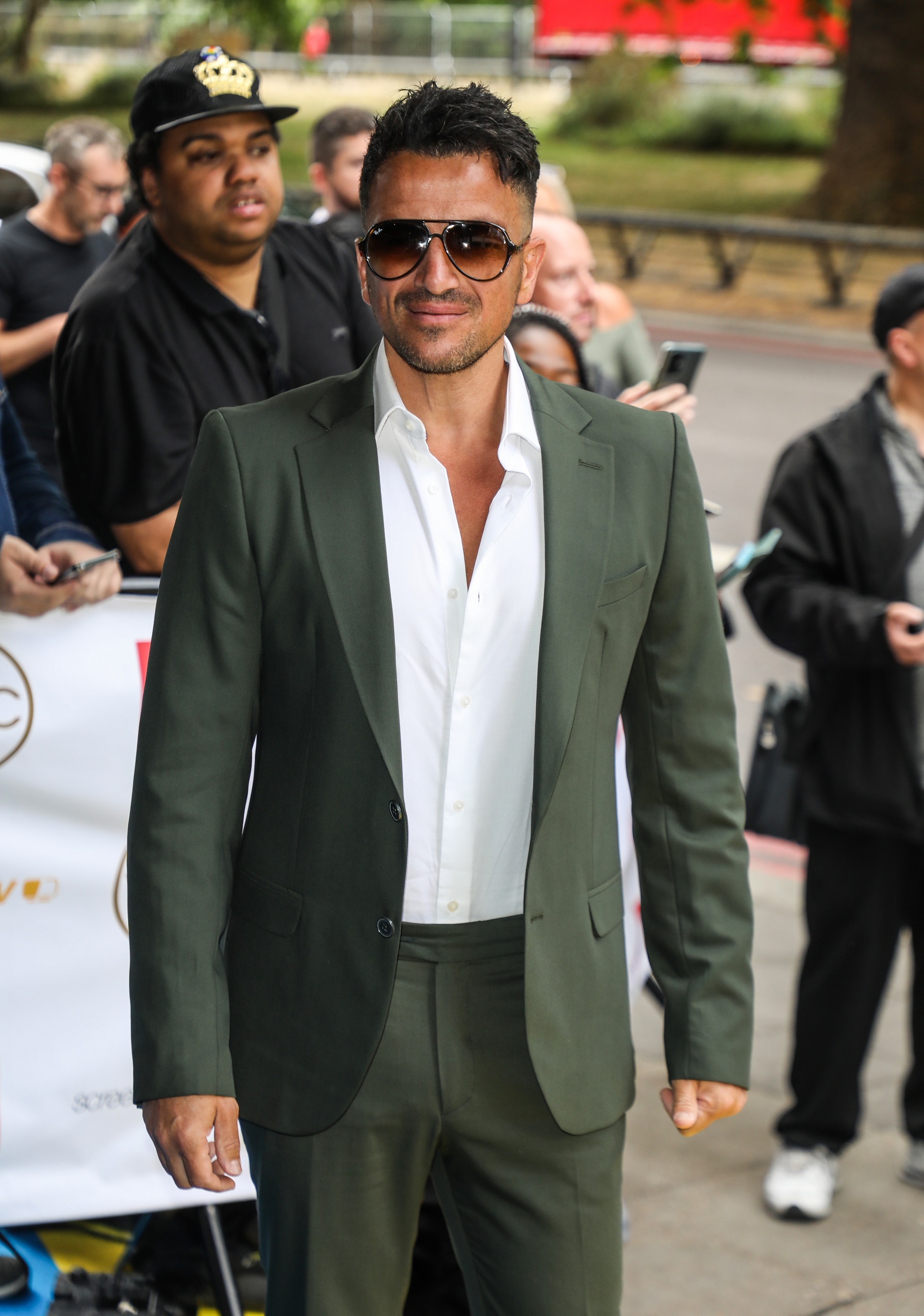 Peter Andre wearing sunglasses on the red carpet