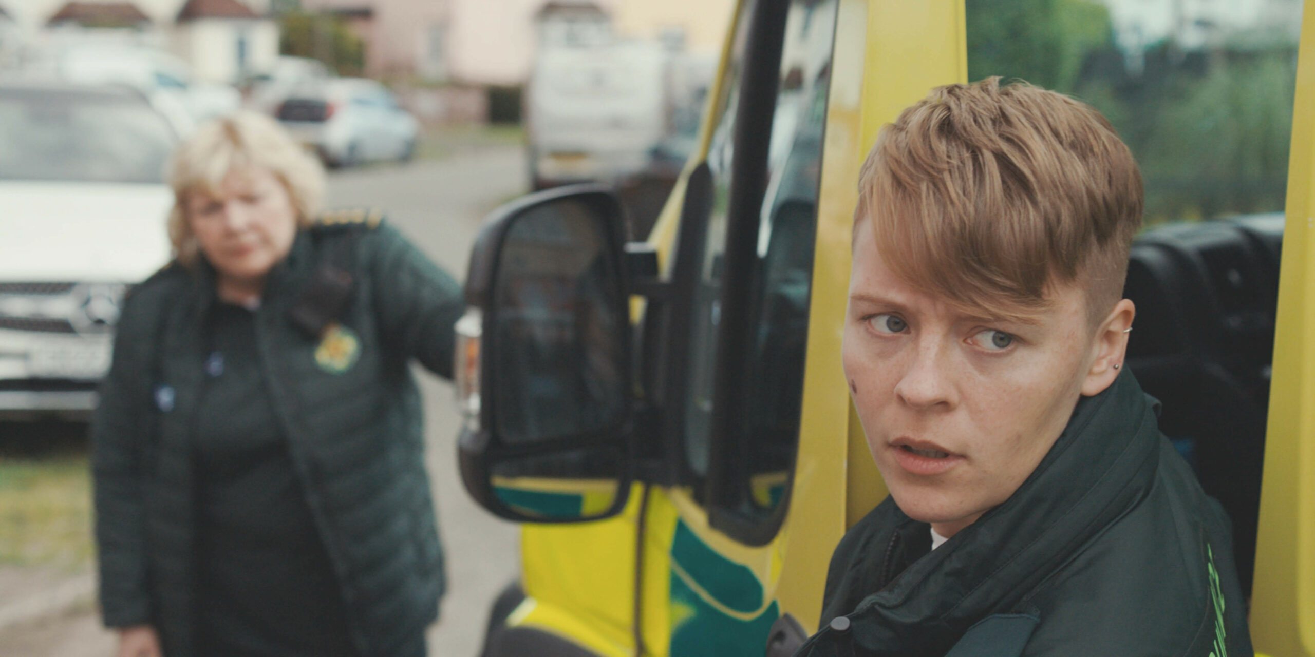 Sah tood by an ambulance in Casualty 