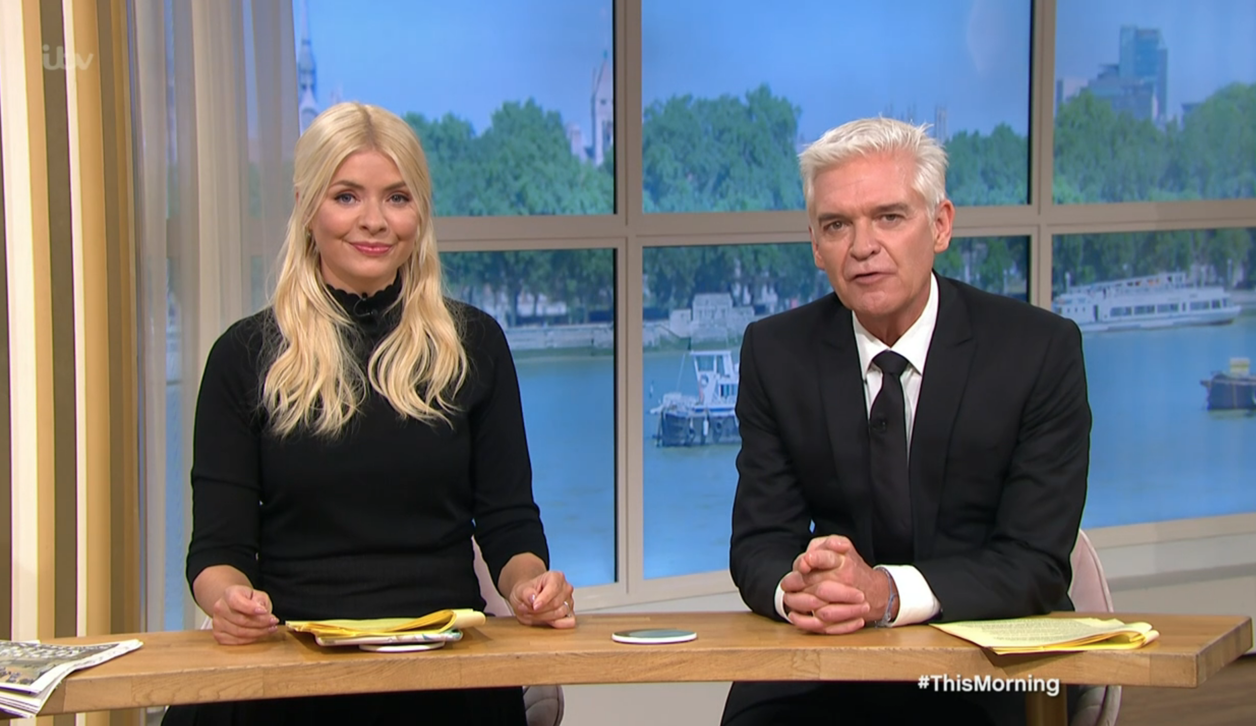 Holly Willoughby and Phillip Schofield on ITV This Morning wearing black.