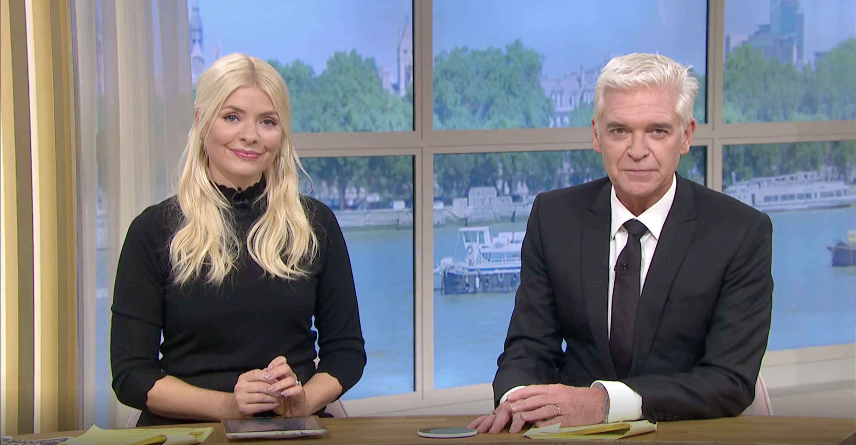 Holly Willoughby and Phillip Schofield on ITV This Morning wearing black.