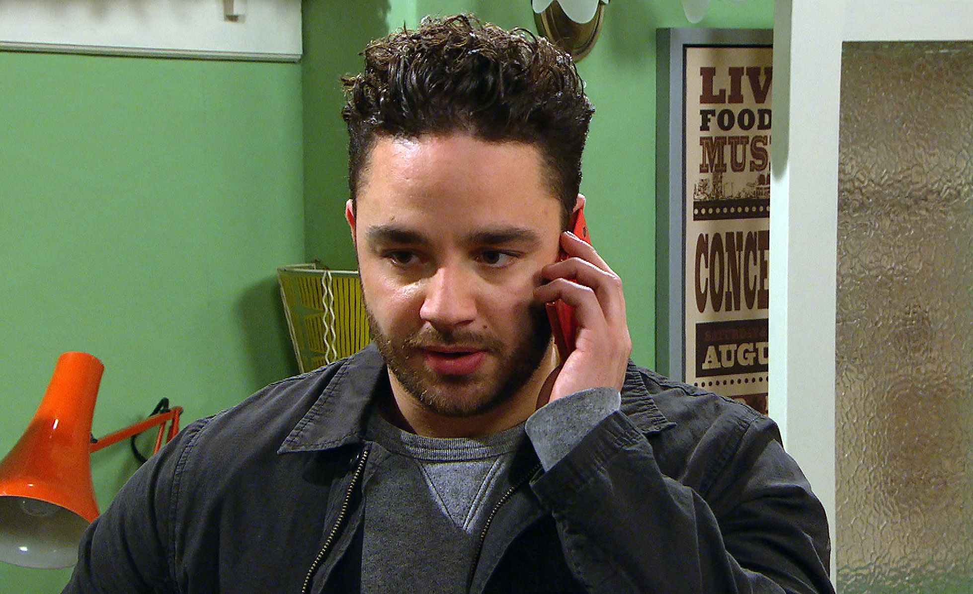 Emmerdale Adam Barton on the phone - he didn't like stepdad Cain Dingle