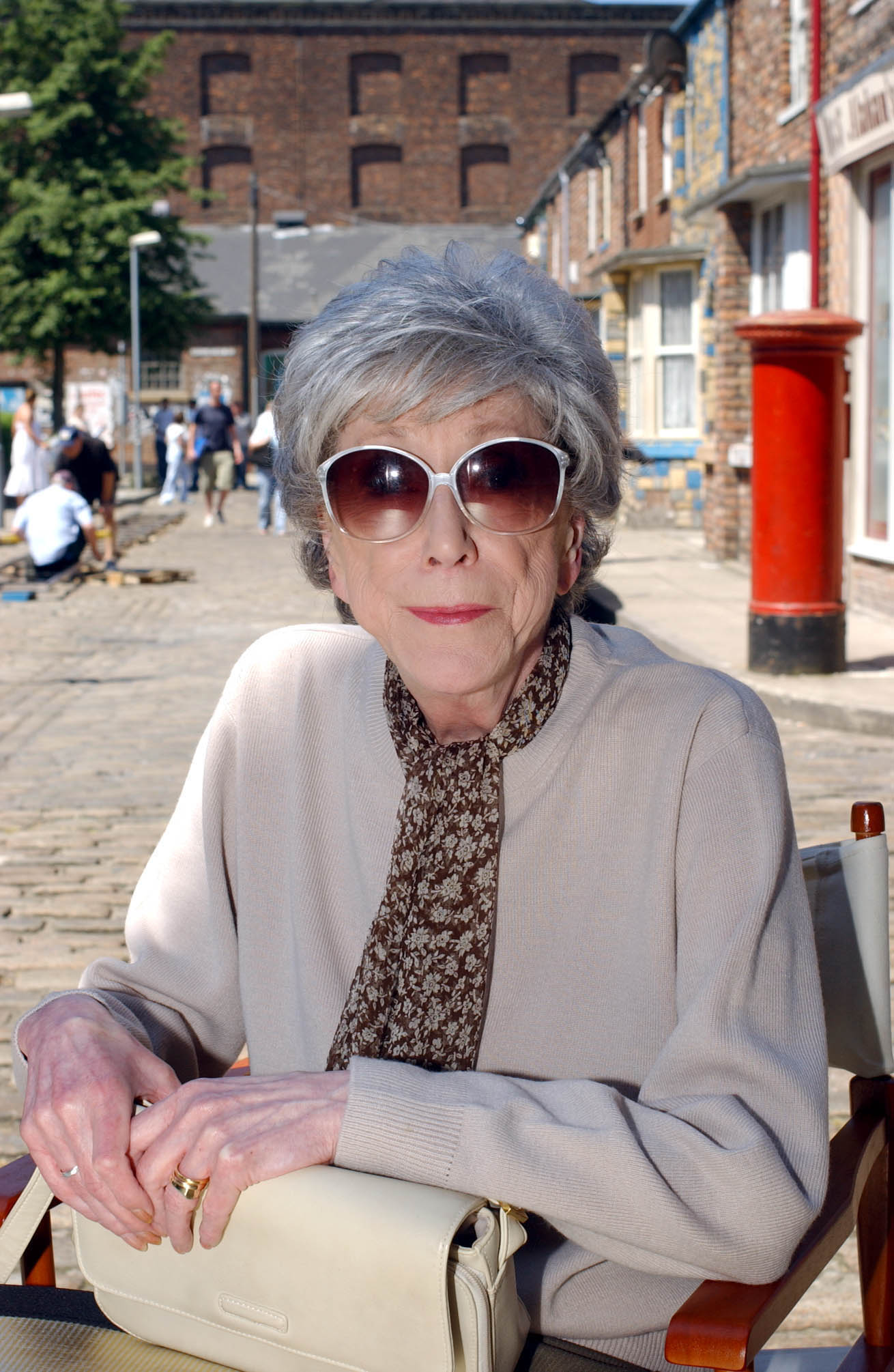 Blanche Hunt smiles on the cobbles