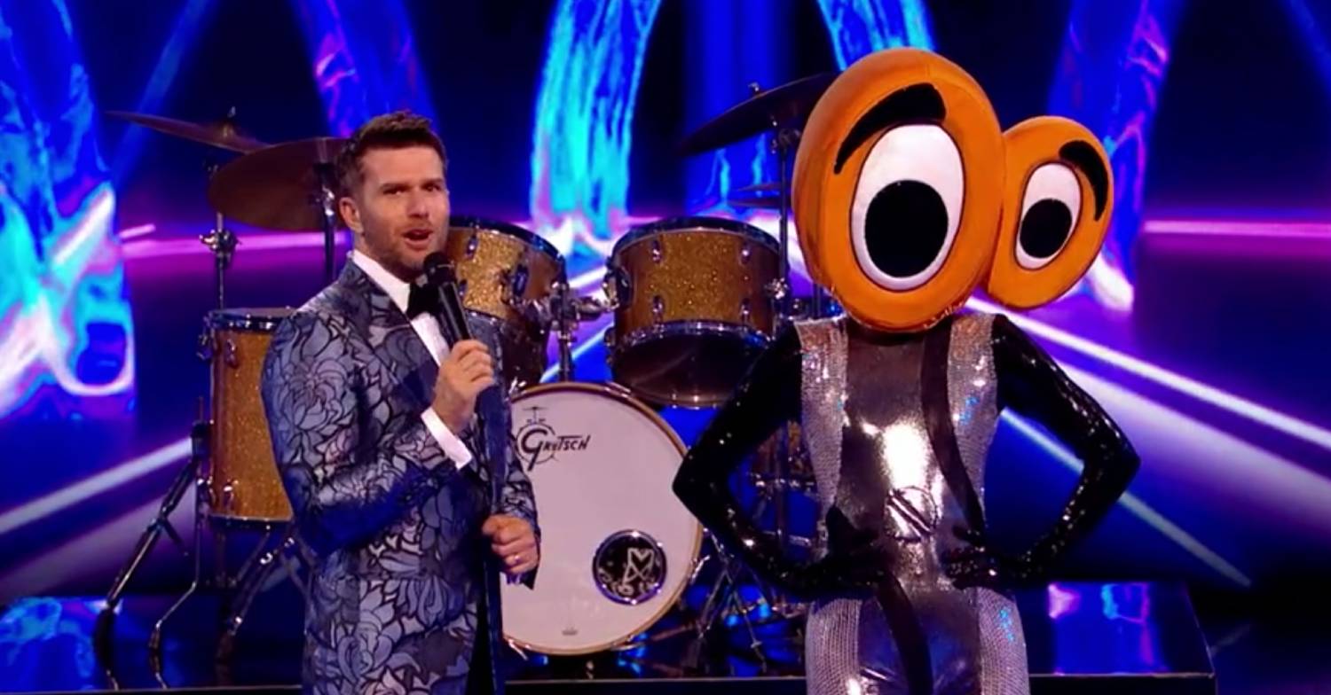 Host Joel Dommett presents Scissors on The Masked Dancer