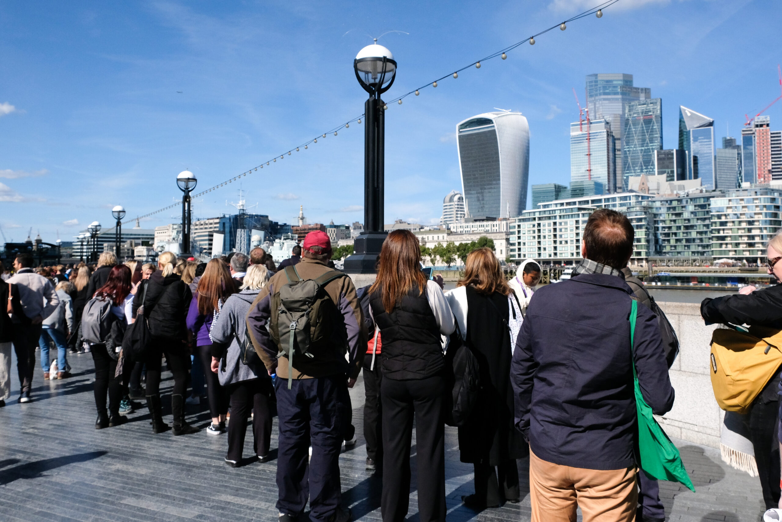 People queue to see the Queen's body lying in state.