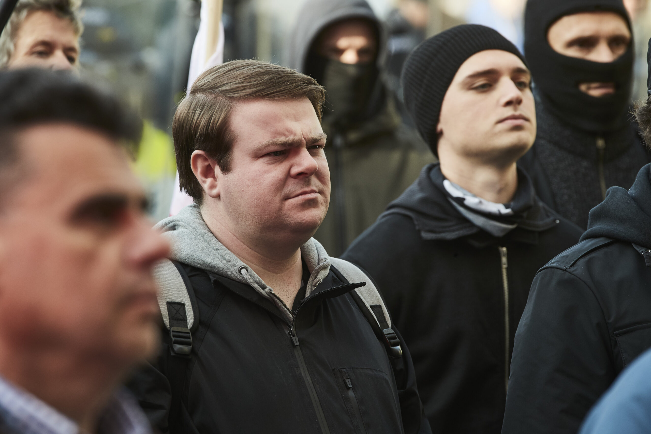 ANDREW ELLIS as Robbie and DEAN-CHARLES CHAPMAN in crowd shot in The Walk-In
