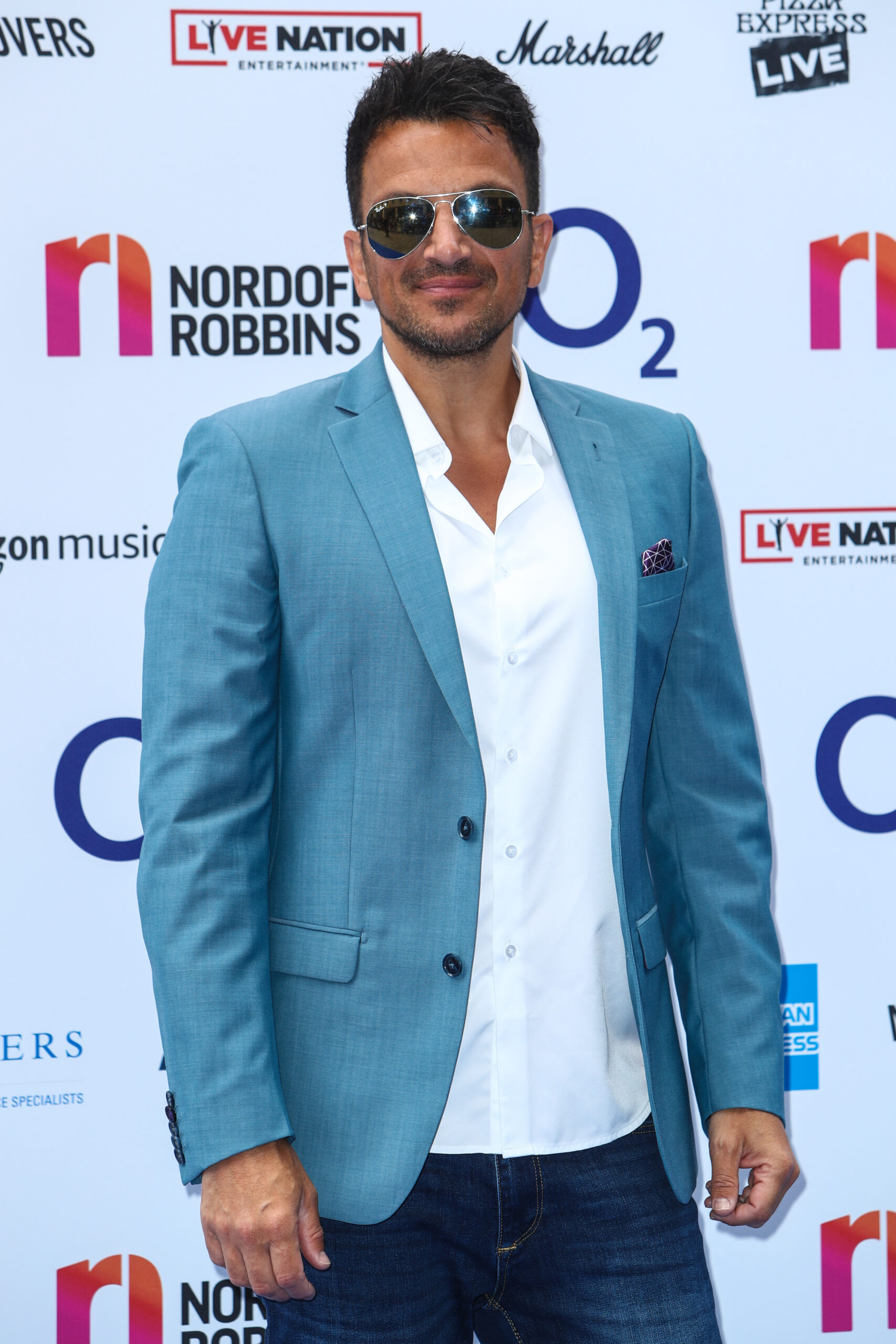 Peter Andre on the red carpet wearing sunglasses