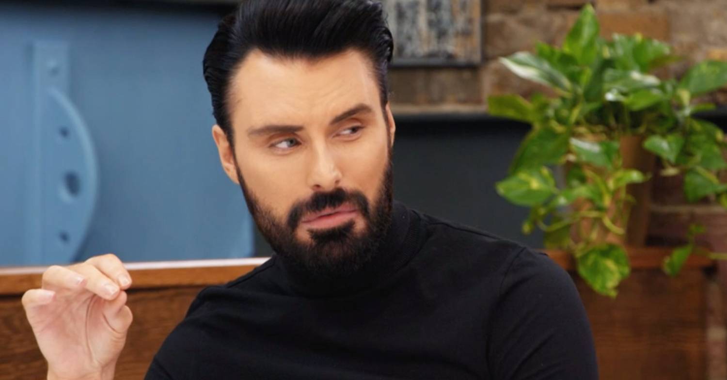 Rylan Clark looks to the side