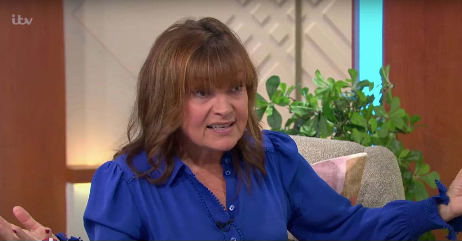 Lorraine Kelly looking serious on her show