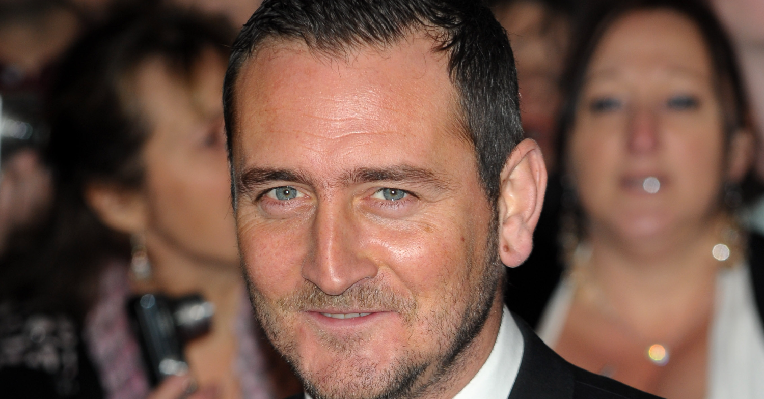 Strictly star Will Mellor smiling at an event