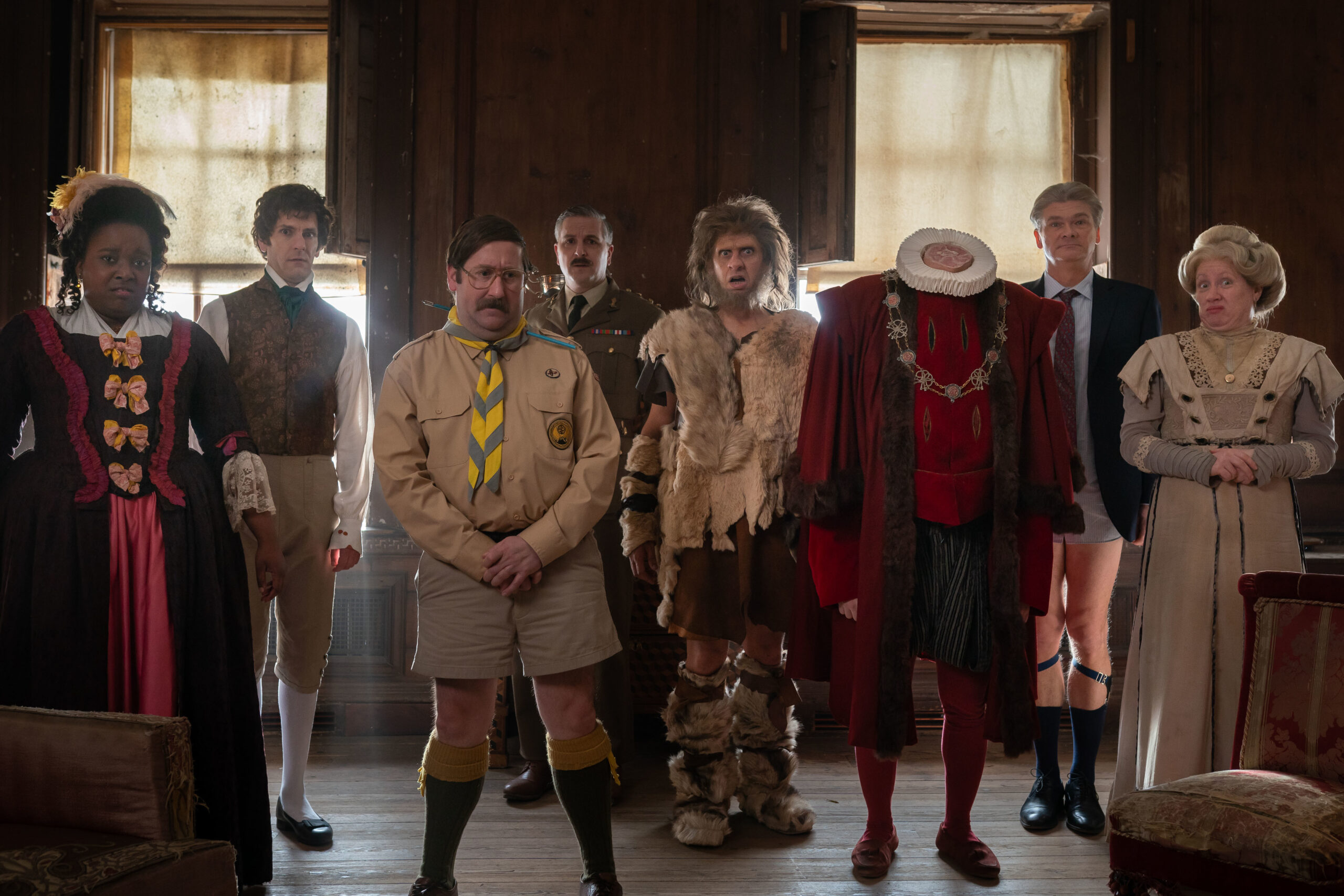Ghosts S4,3,Kitty (LOLLY ADEFOPE), Thomas Thorne (MAT BAYNTON), Pat (JIM HOWICK), The Captain (BEN WILLBOND), Robin LARRY RICKARD), Julian (SIMON FARNABY), Lady Button (MARTHA HOWE- DOUGLAS) The ghosts stand in a room all looking sad