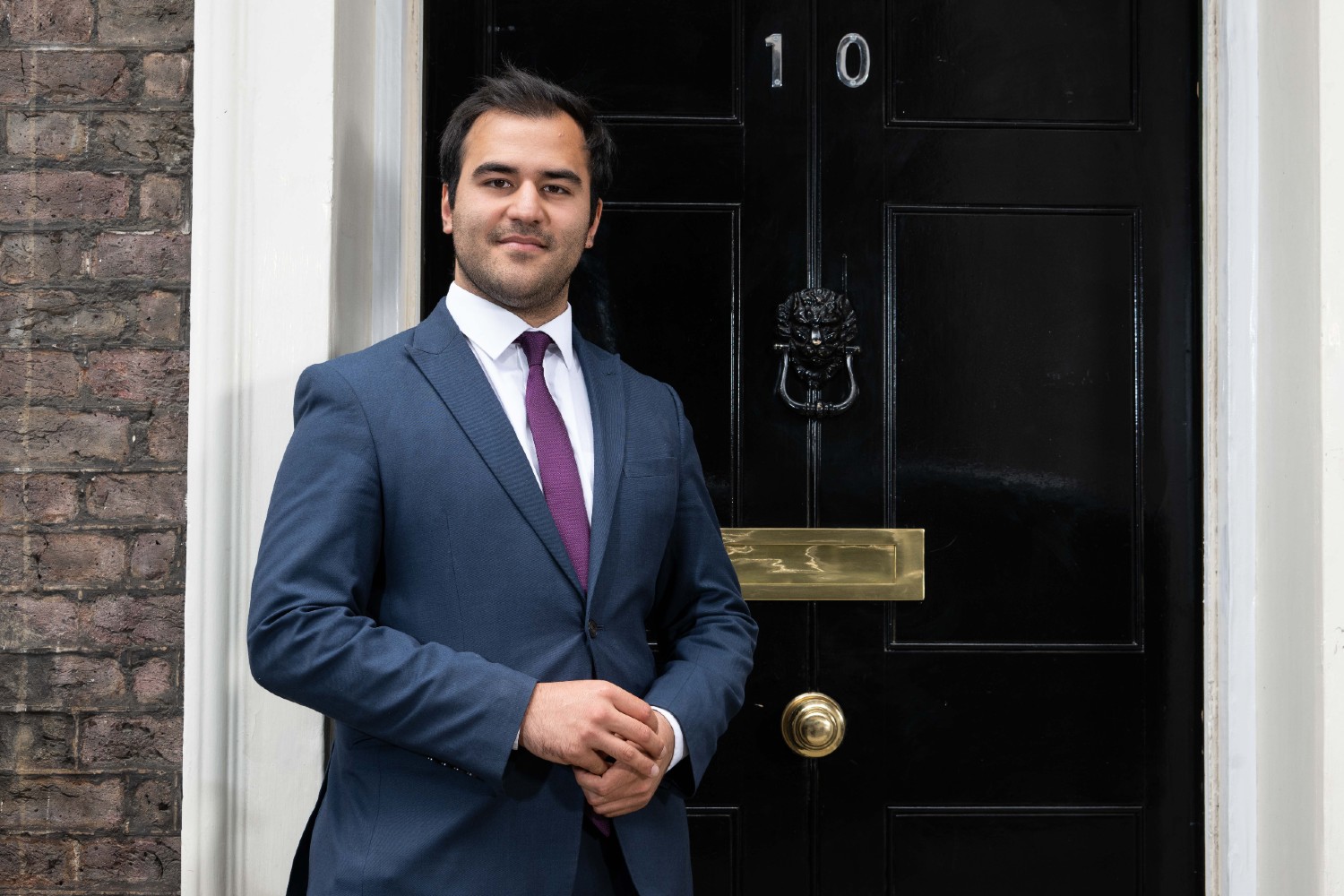 Darius smiling in Make Me Prime Minister
