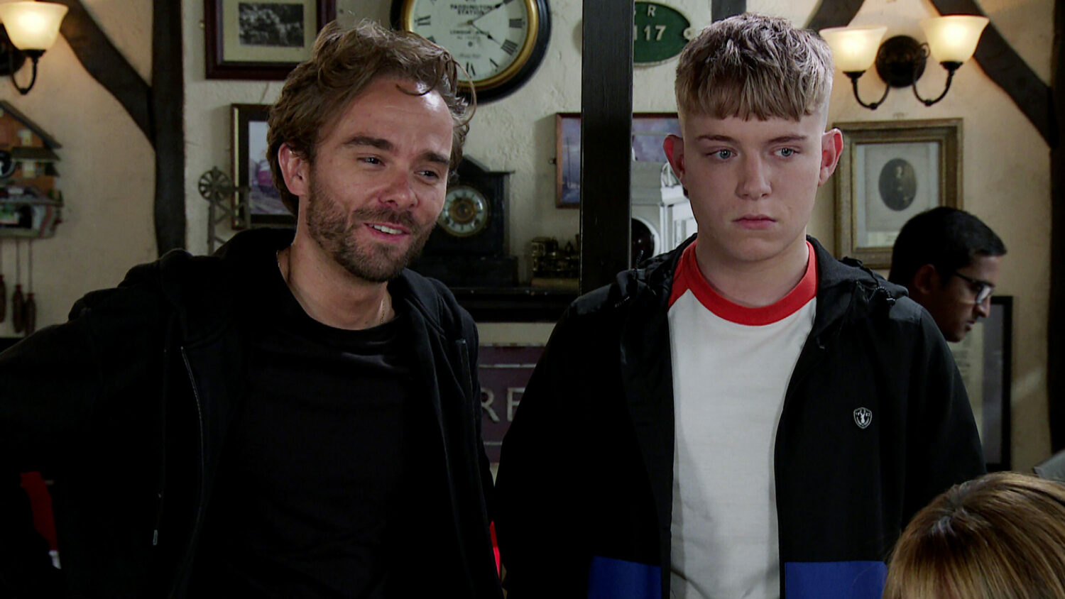 Coronation Street David and Max looking frustrated at Roy's