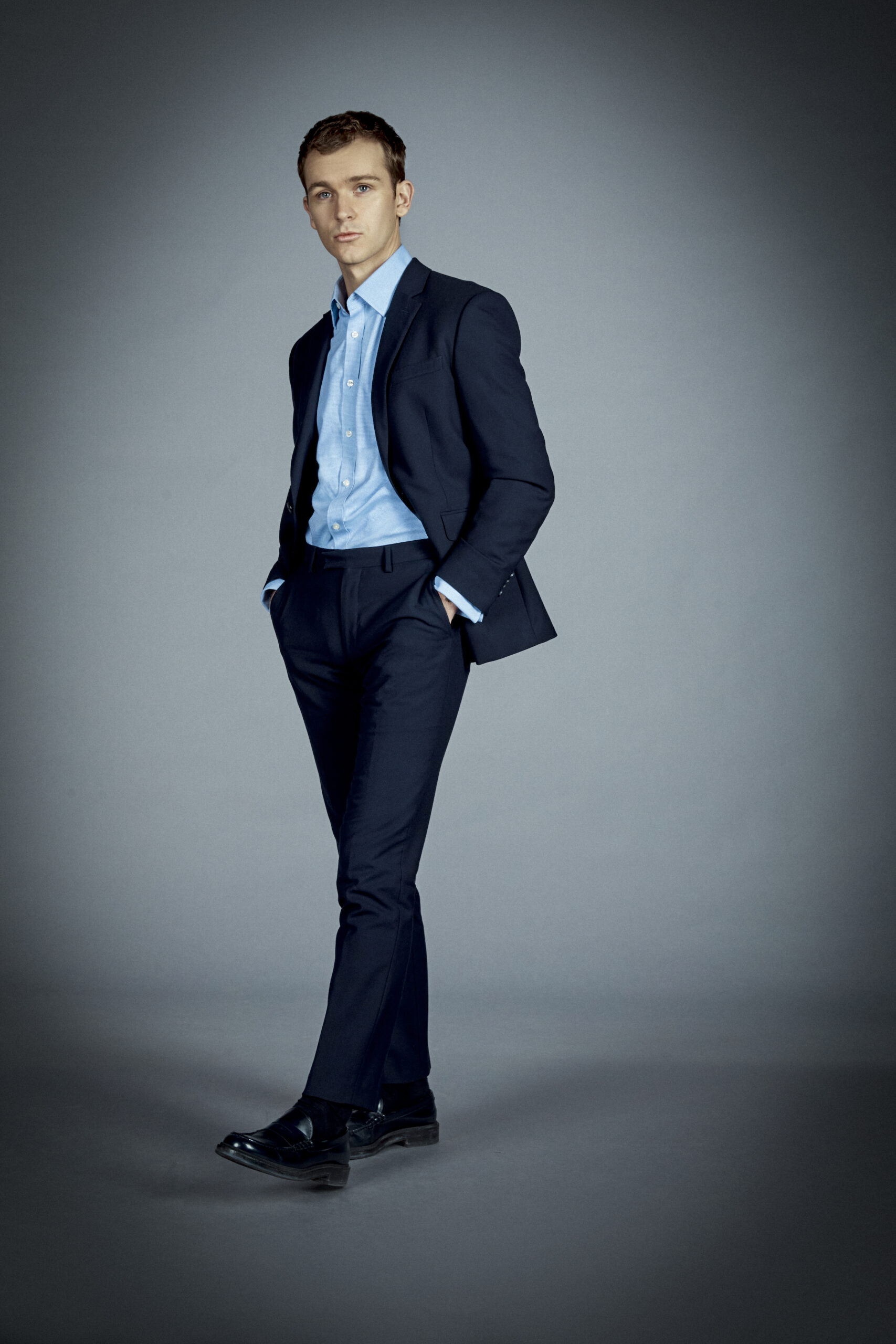 Harry Lawtey in blue suit as Robert Spearing in Industry series 2