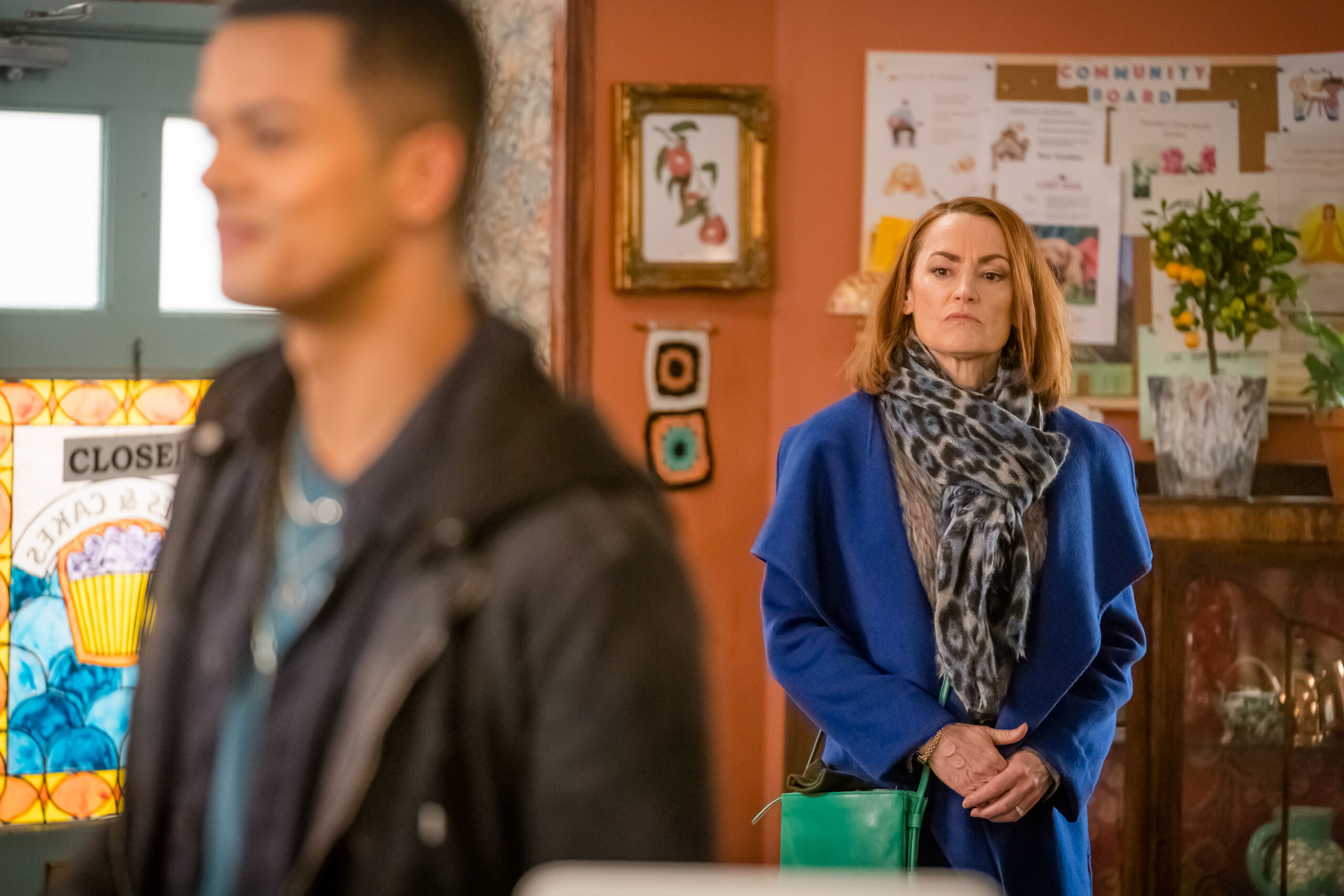 Pooky Quesnel as Louise, she looks over at Dan with distaste