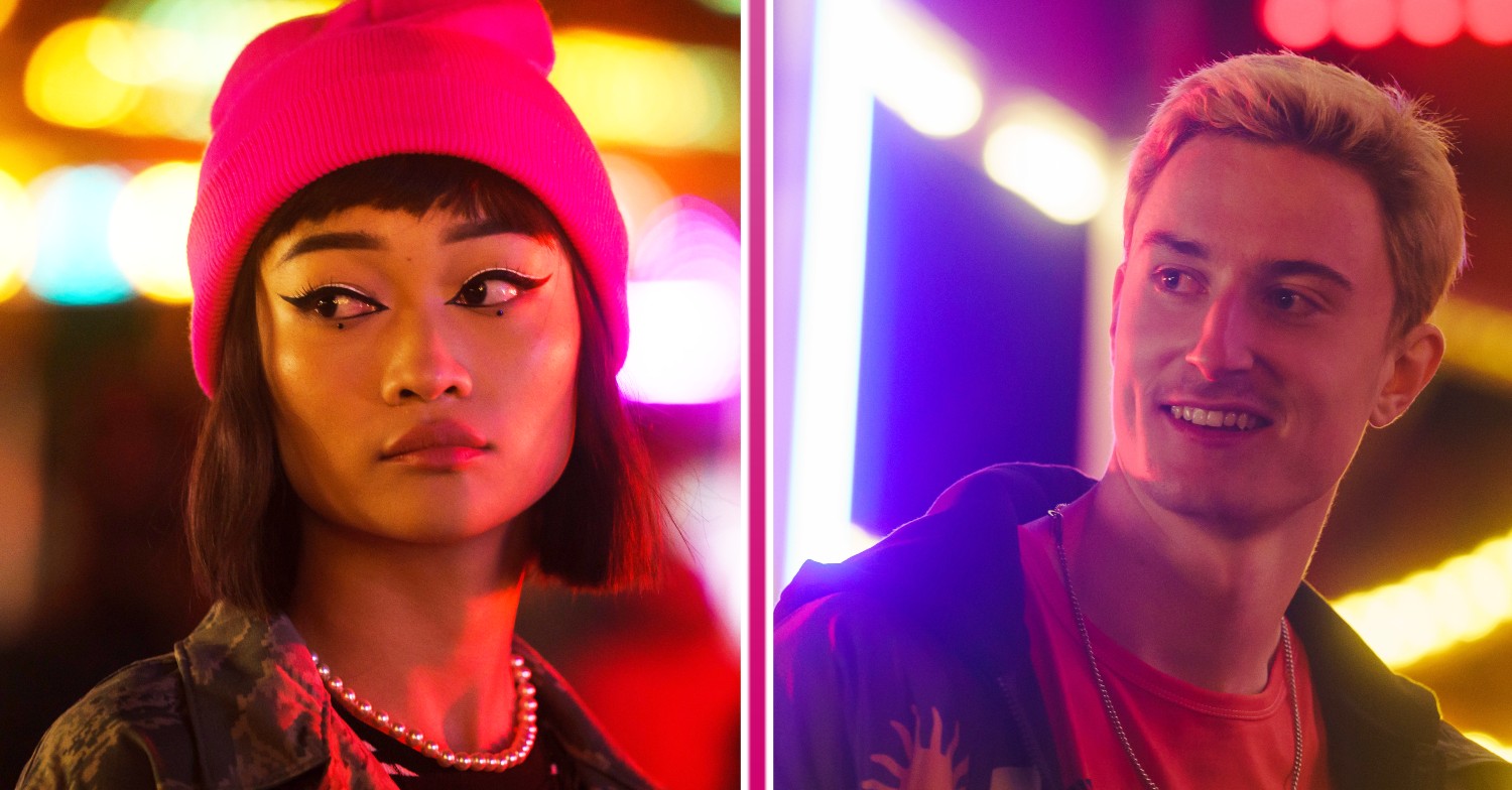 Callina Liang and Eden H. Davies looking over their shoulder in Tell Me Everything