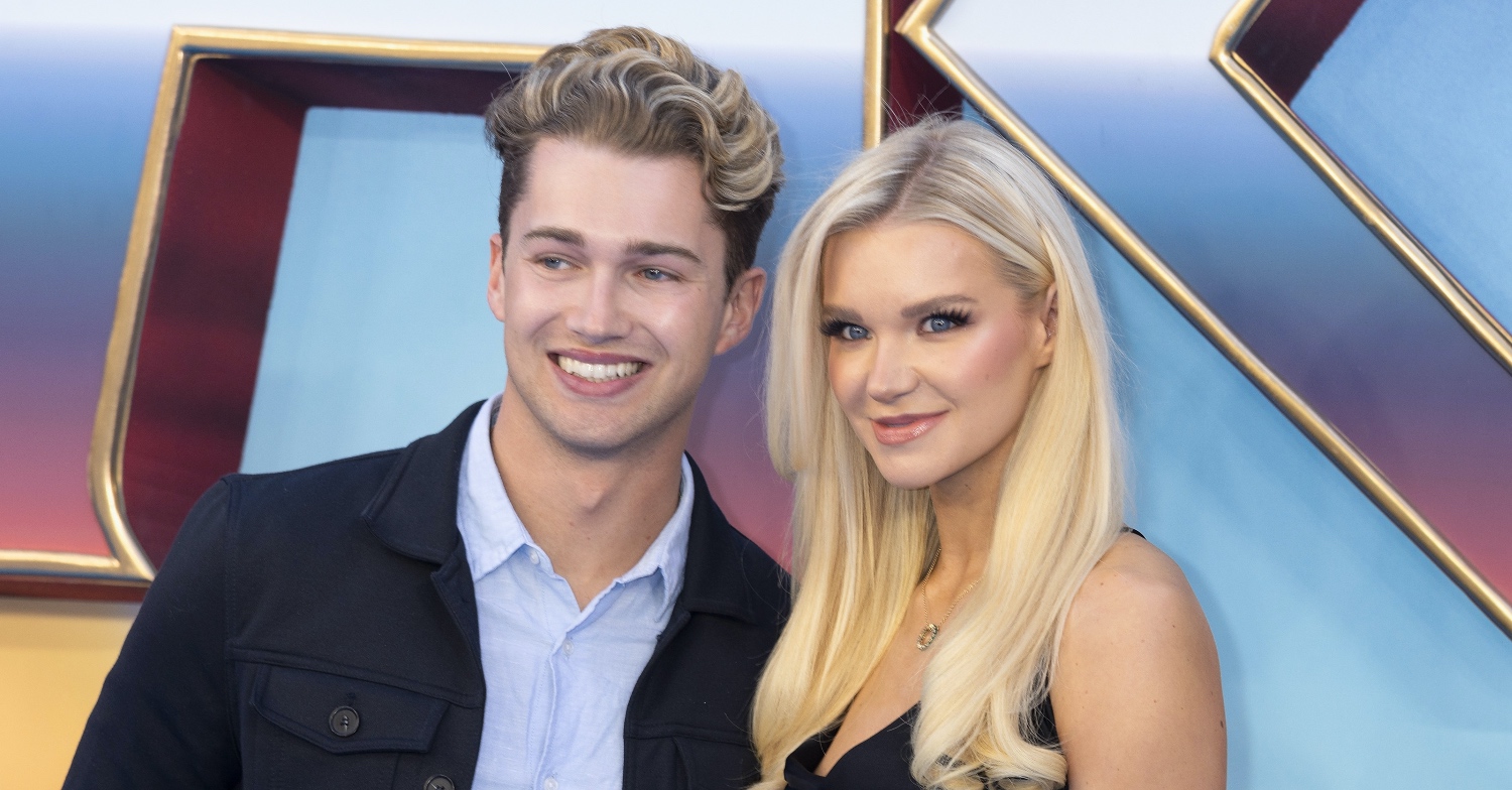 AJ Pritchard and girlfriend Abbie posing on a red carpet