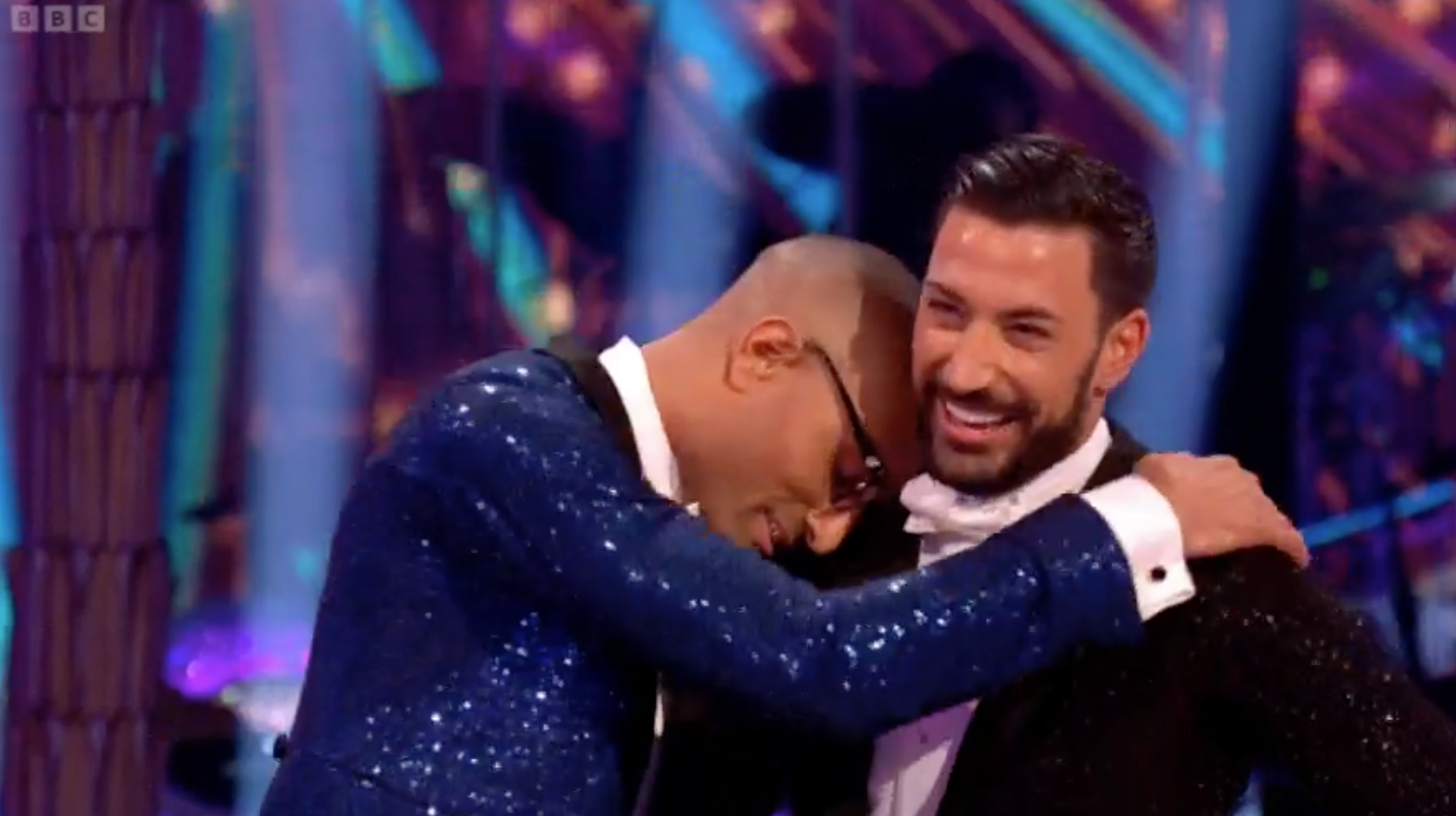 Giovanni Pernice smiling and cuddling Richie