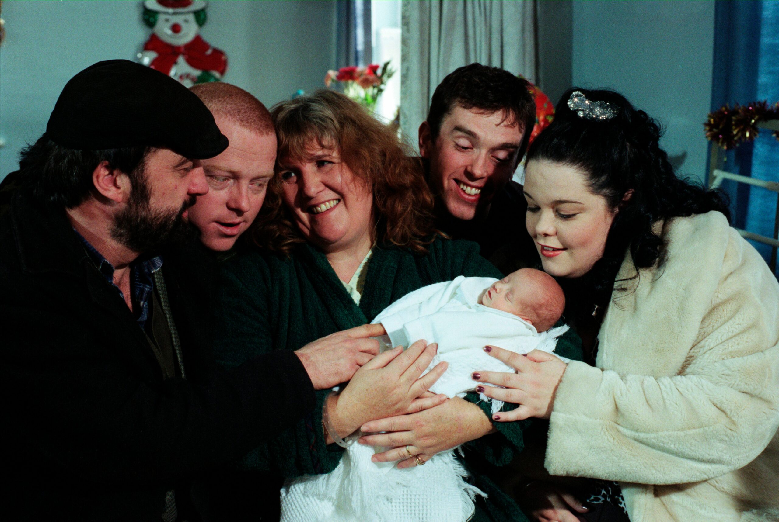 Baby Belle with the Dingle family