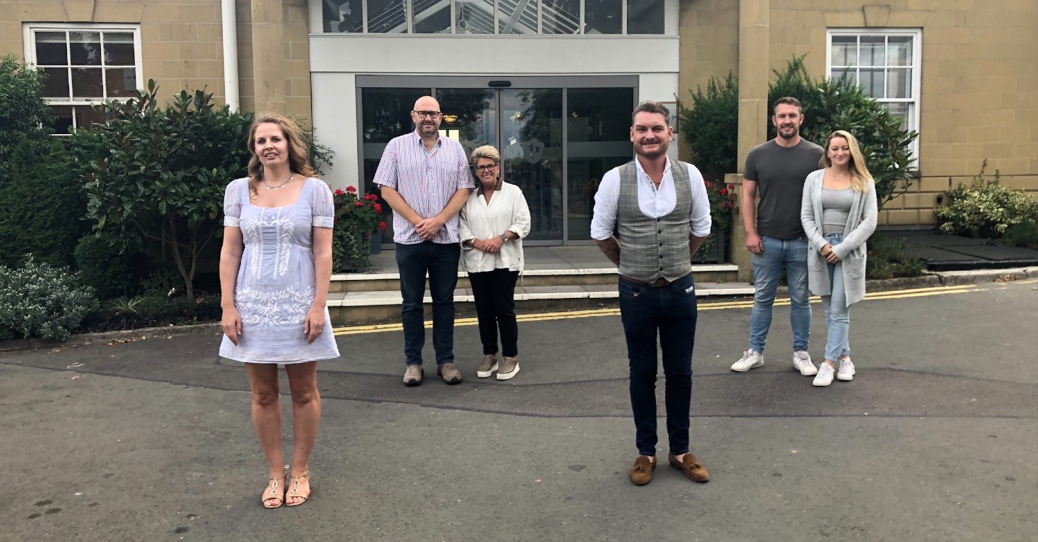 Four in a Bed contestants standing together in the Channel 4 show