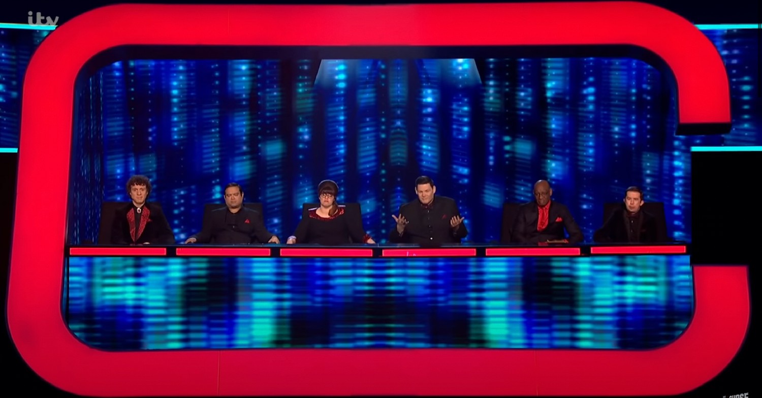 Beat the Chasers stars sitting at the podium