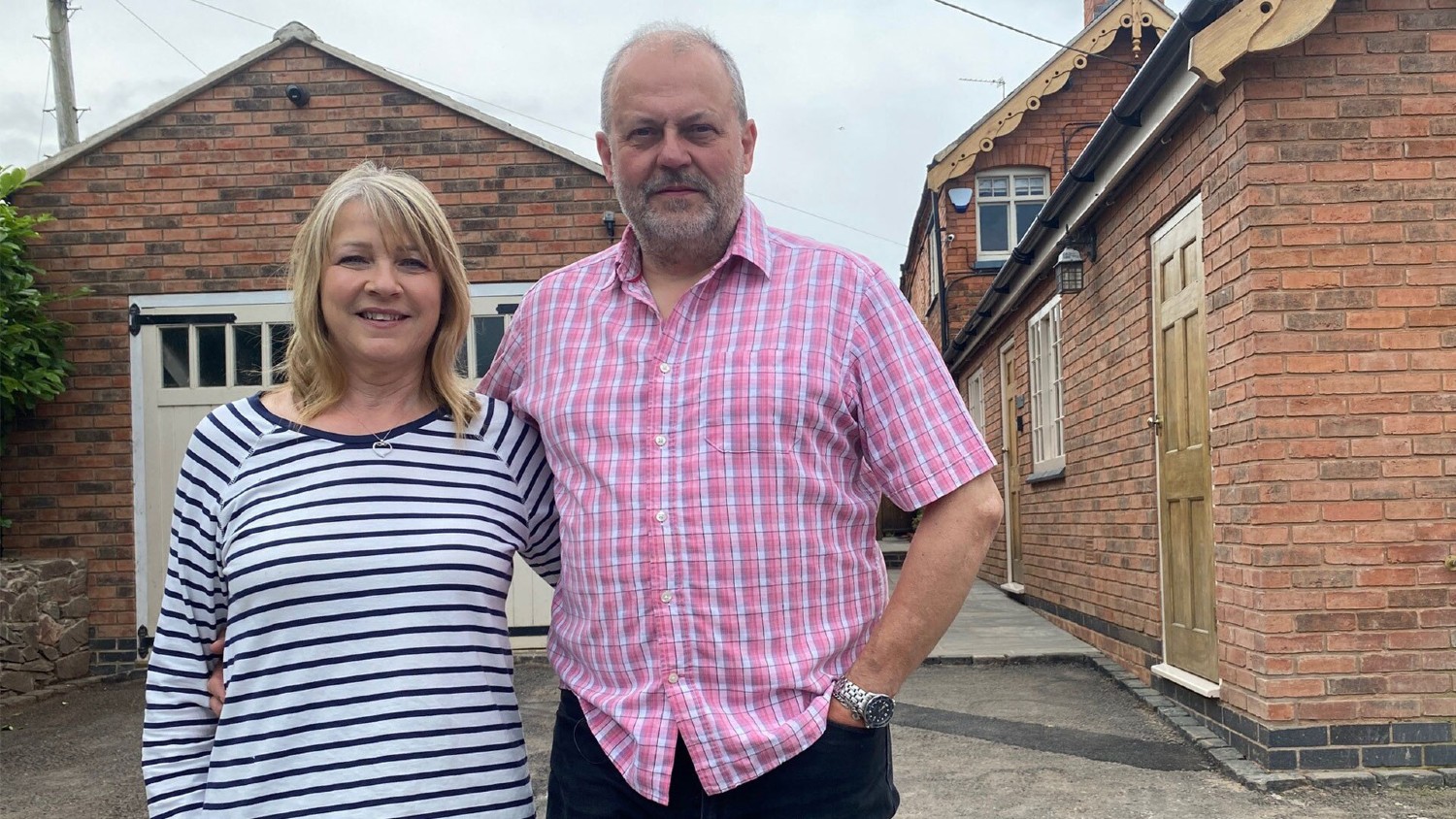 Liz and Gary smiling on Four in a Bed