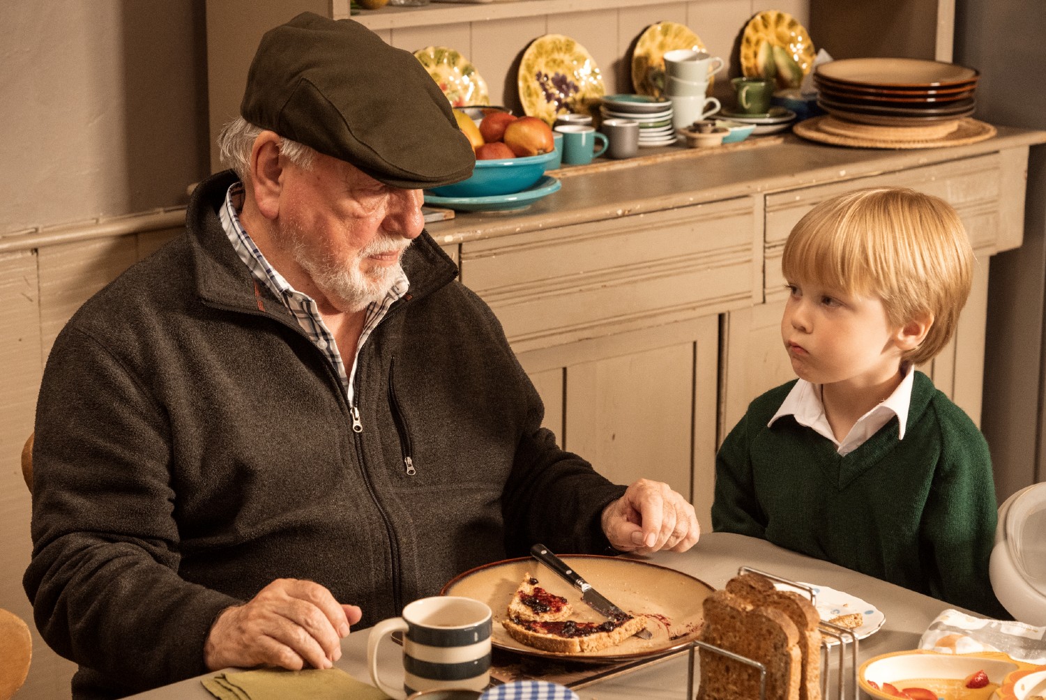 Terry Glasson talking to his grandson