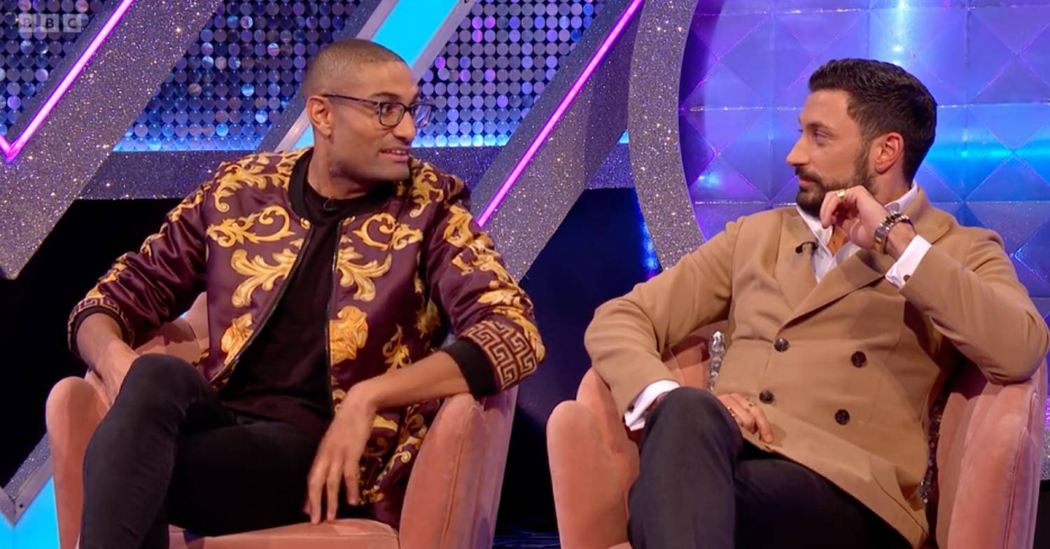 Giovanni Pernice and Richie Anderson look at each other on It Takes Two