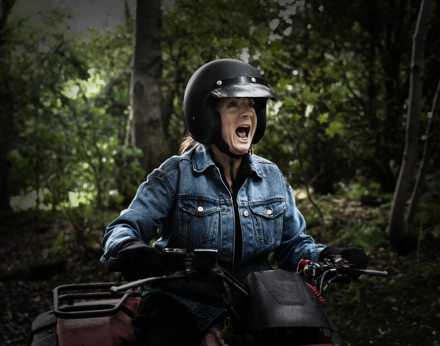 Harriet Finch screaming on a quad bike