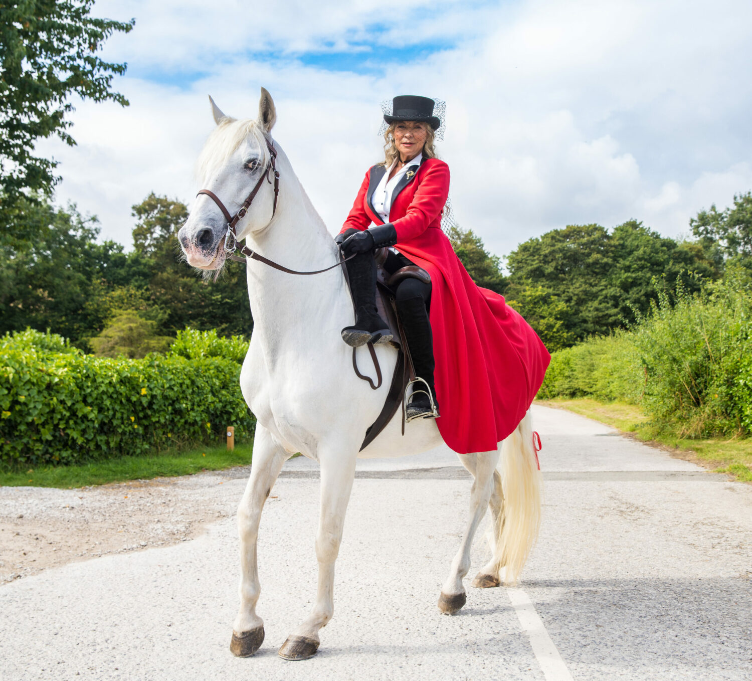 Kim Tate rides into her wedding this week on a white horse