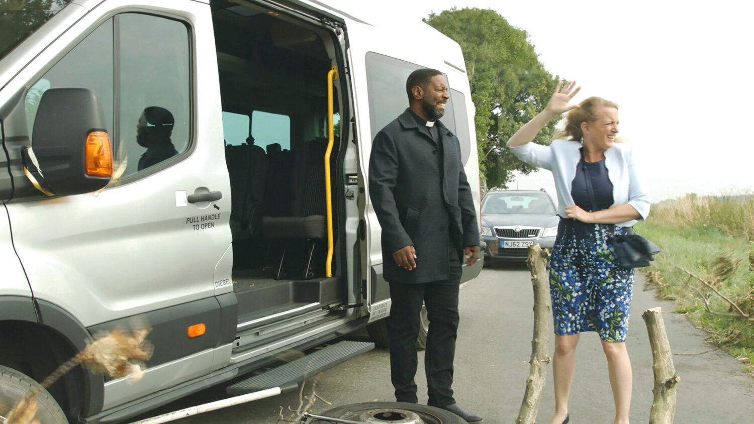Nicola and Charles outside of an abandoned minibus