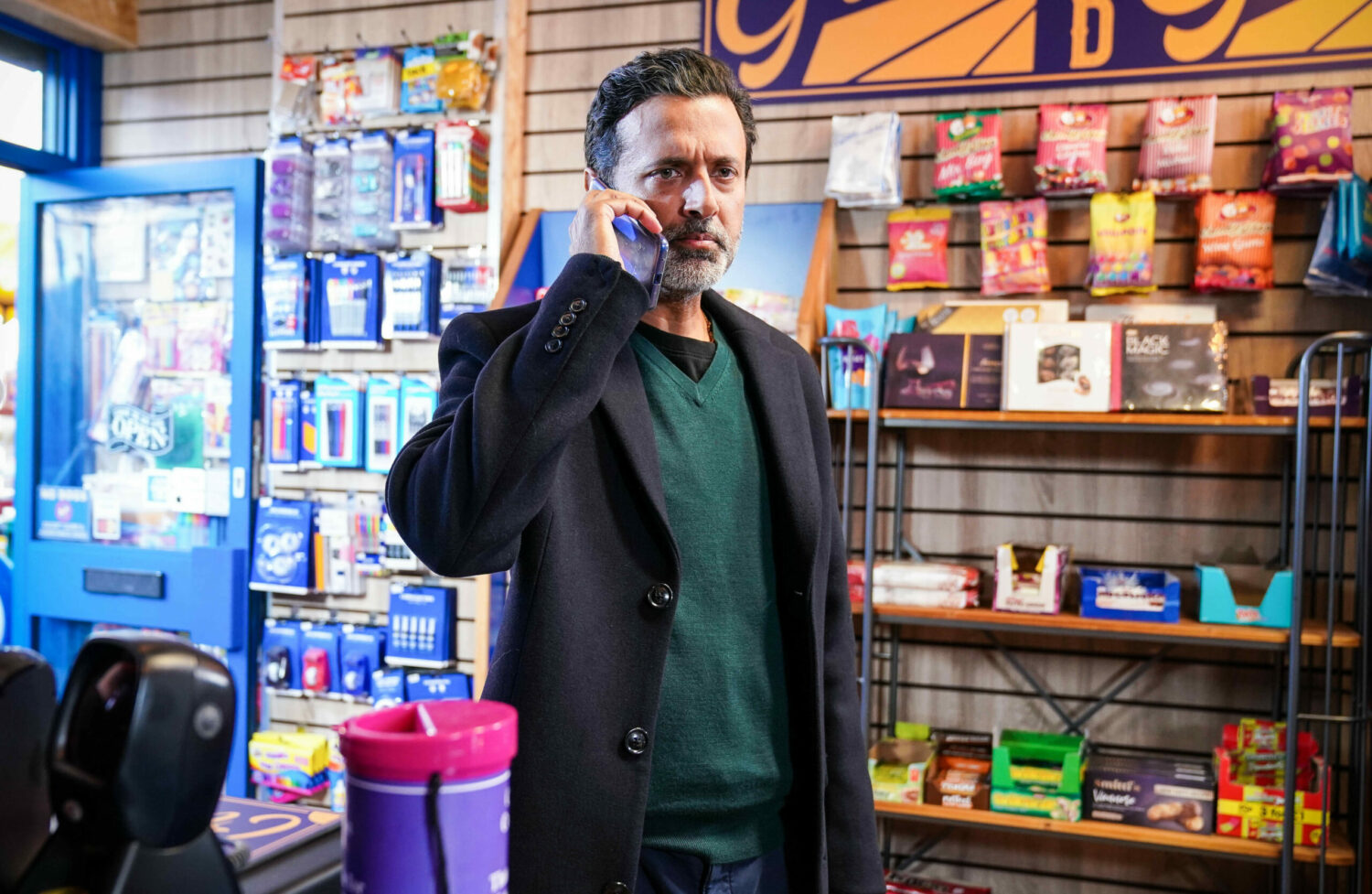 Nish Panesar on the phone looking angry