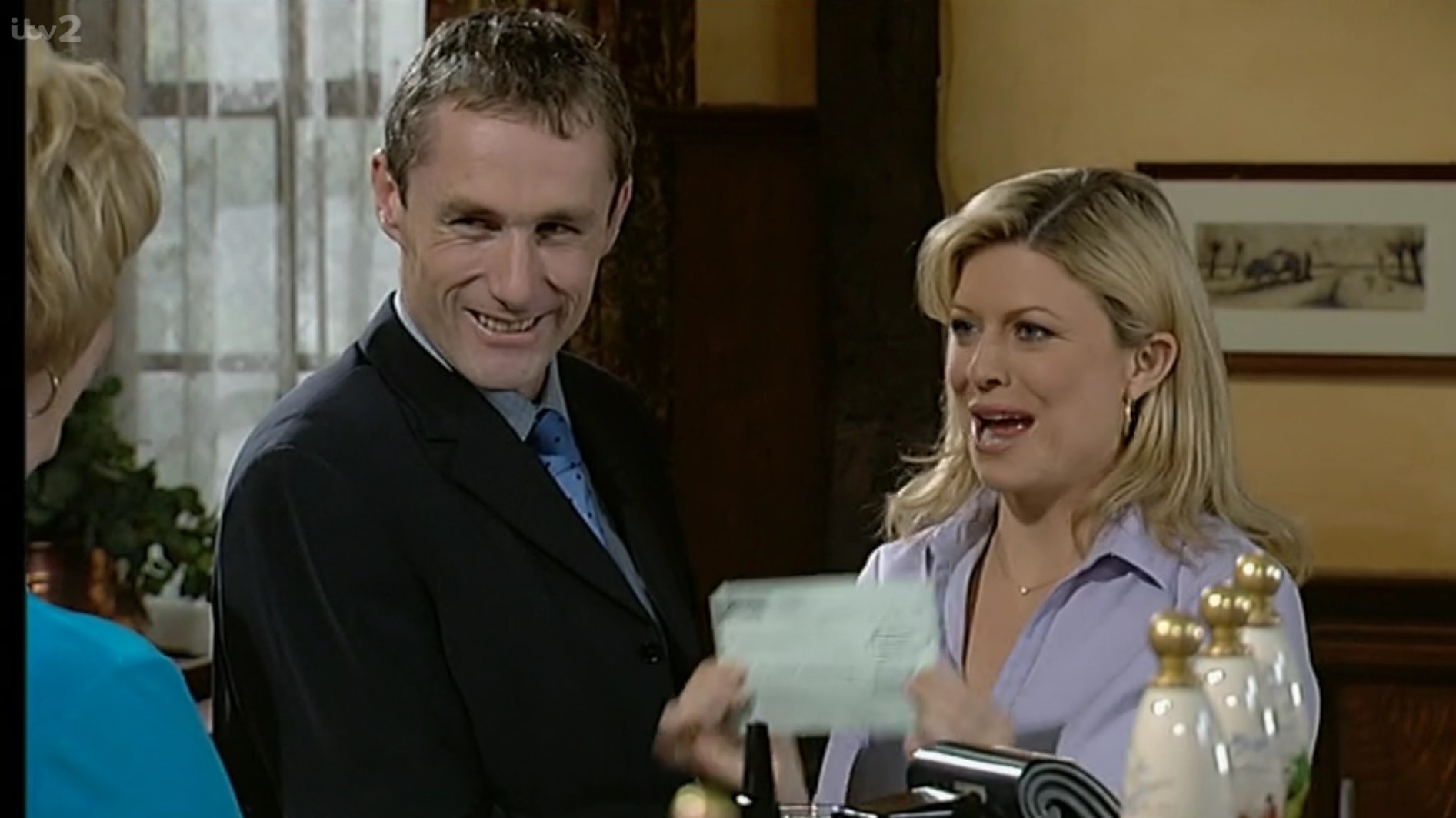 Emmerdale Ray and Louise present a cheque to Diane