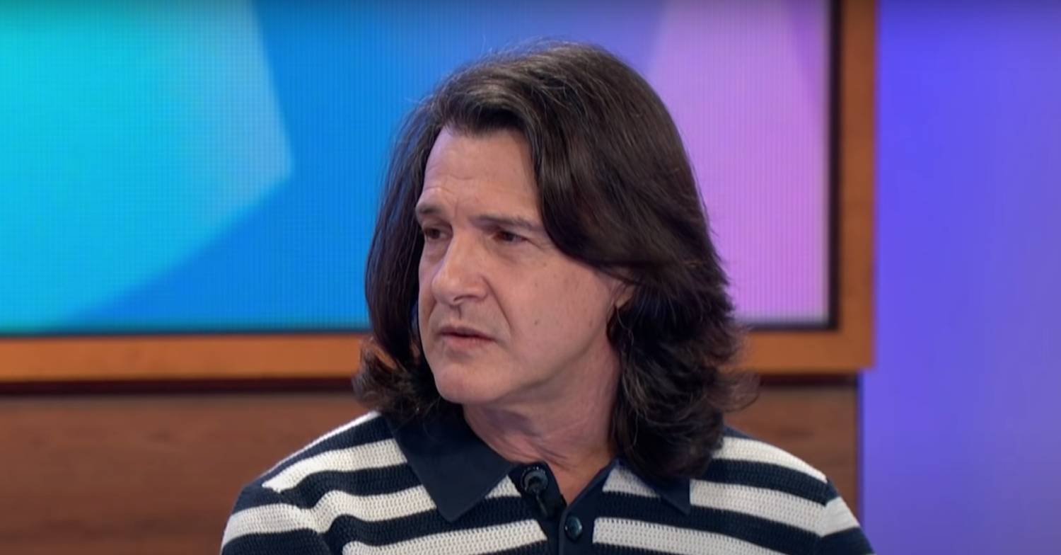 Scott Mitchell looks concerned