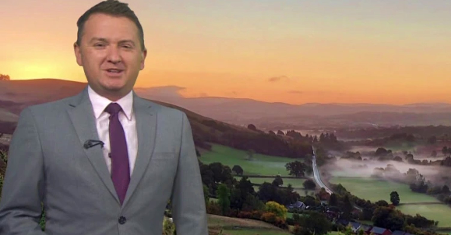 BBC Breakfast weatherman in front of a sunrise