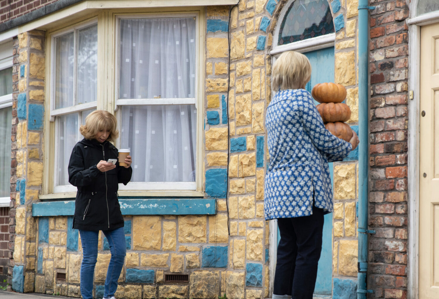 Gail looking at her phone in Coronation Street