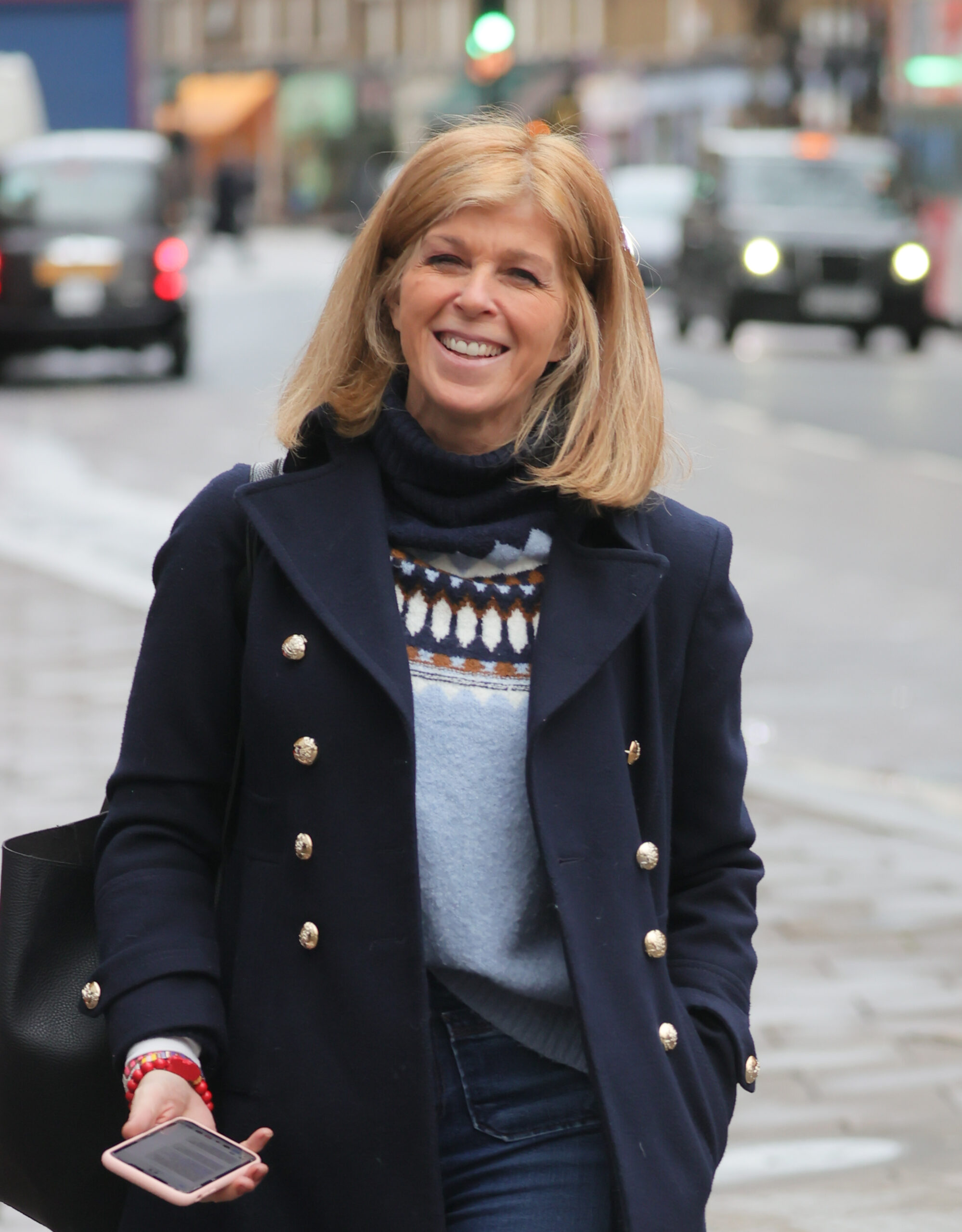 Kate Garraway smiling wearing a coat
