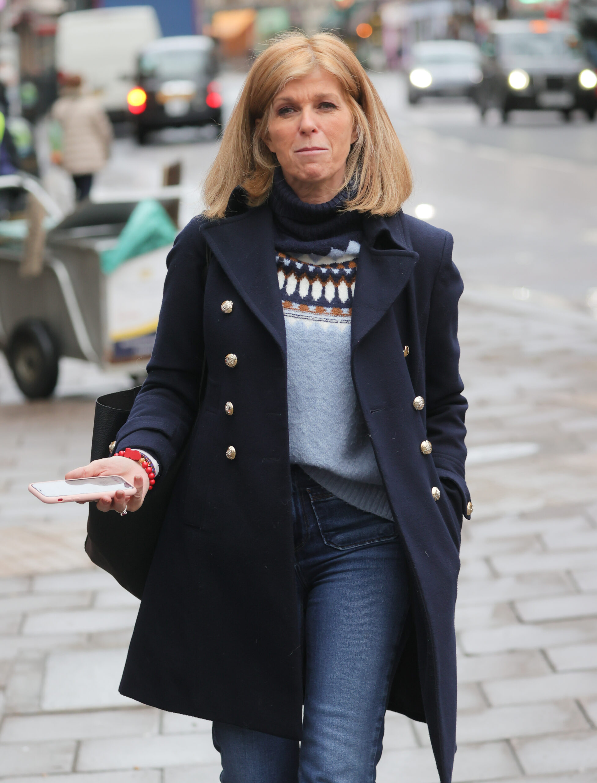 Kate Garraway smiling wearing a coat