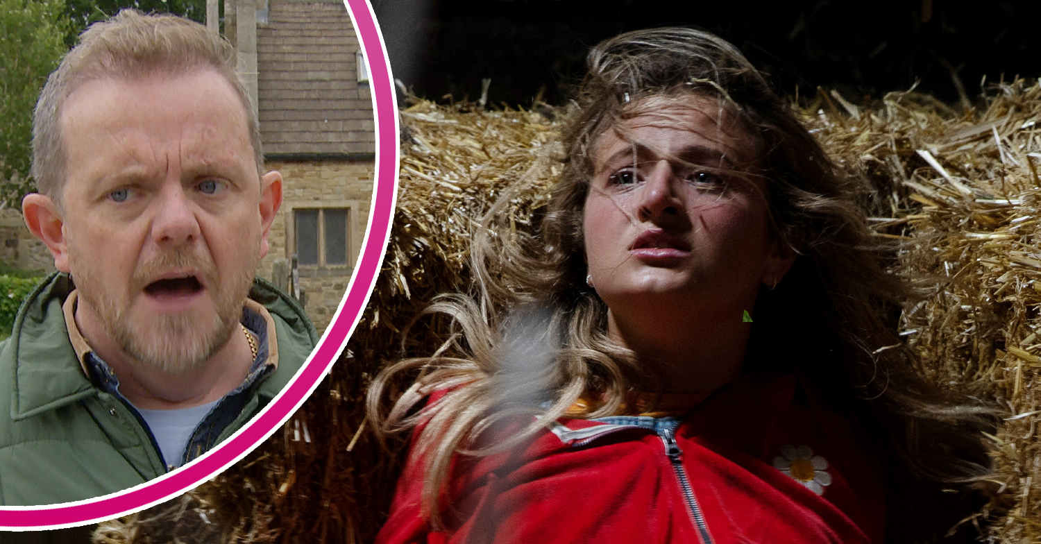 Emmerdale Dan looking concerned and Amelia in pain in the barn