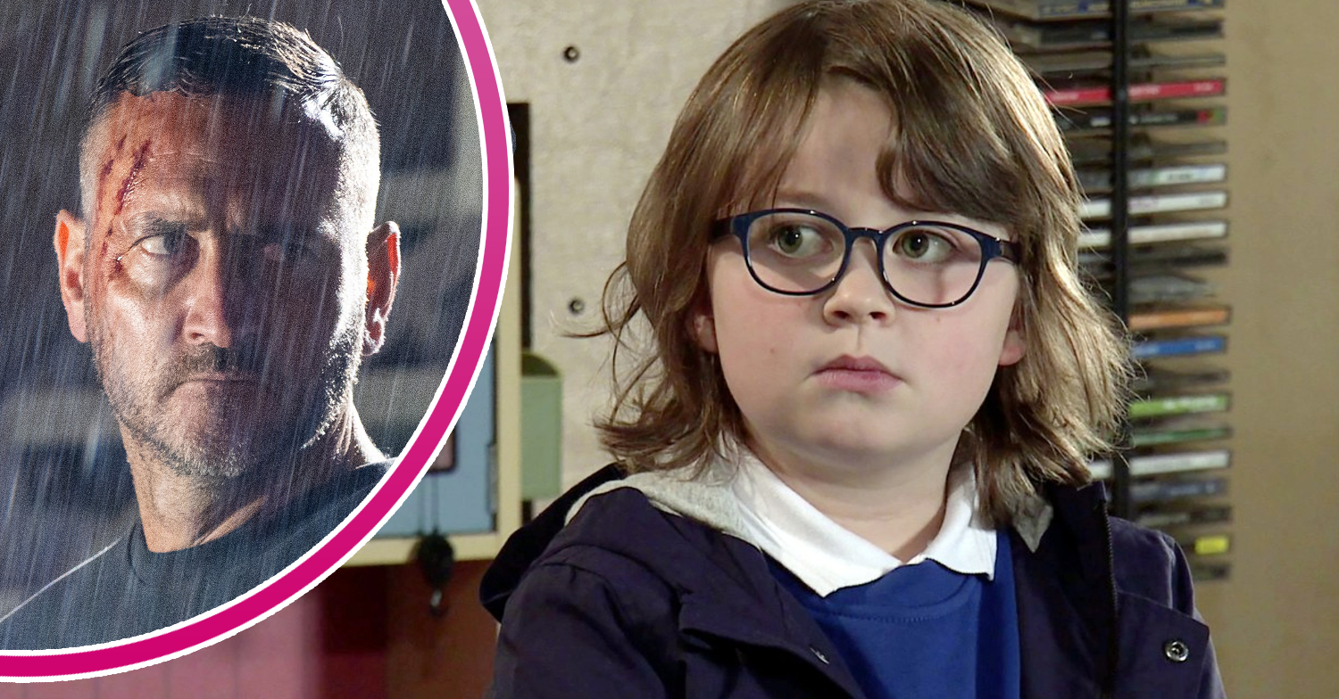 Coronation Street Harvey with blood on his head in the rain, and Sam looking sad in his school uniform