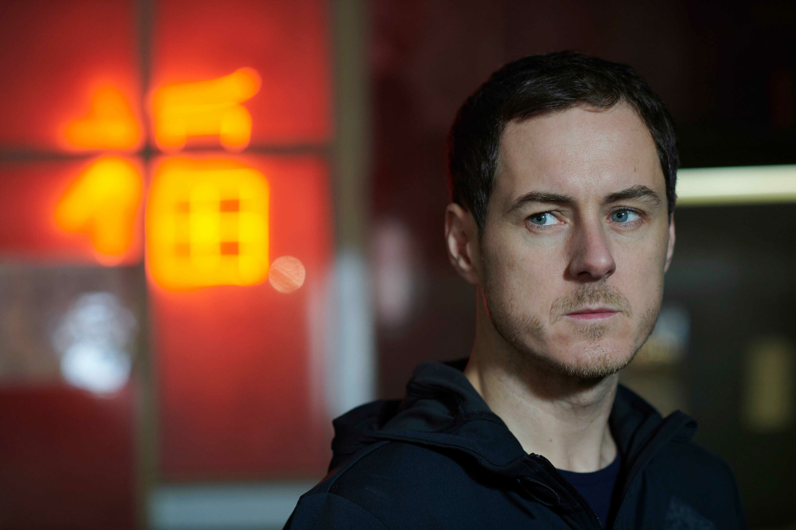 Andrew Knott looks into the far distance in Strangers