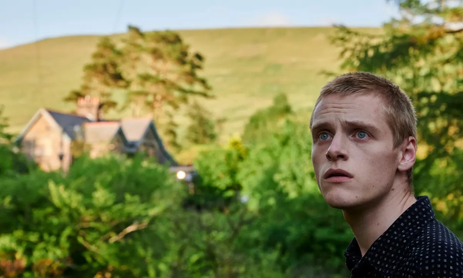 Somewhere Boy Channel 4: Lewis Gribben looking shocked in Somewhere Boy