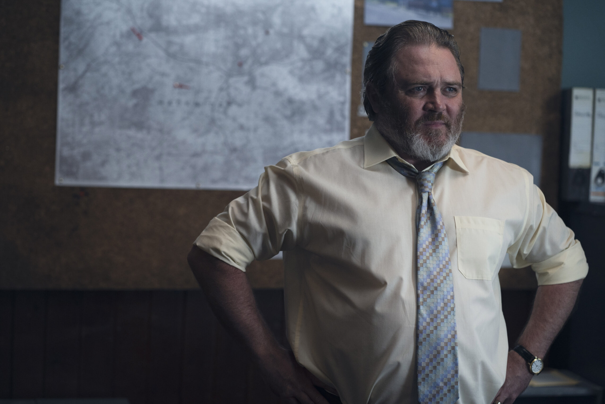 Alex Ferns as DS Nick Holness in The Devil's Hour, looking concerned