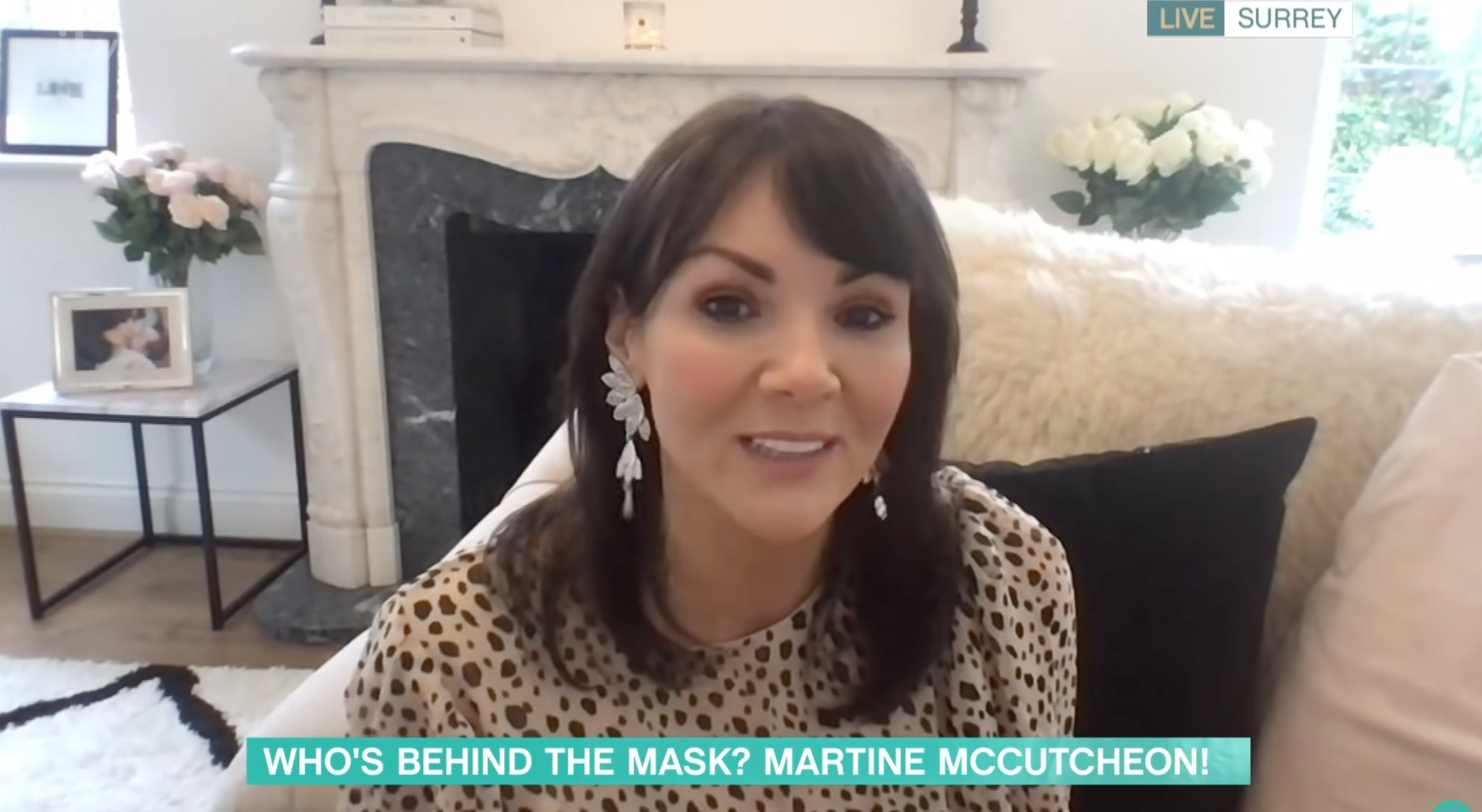 Martine McCutcheon being interviewed in big silver earrings