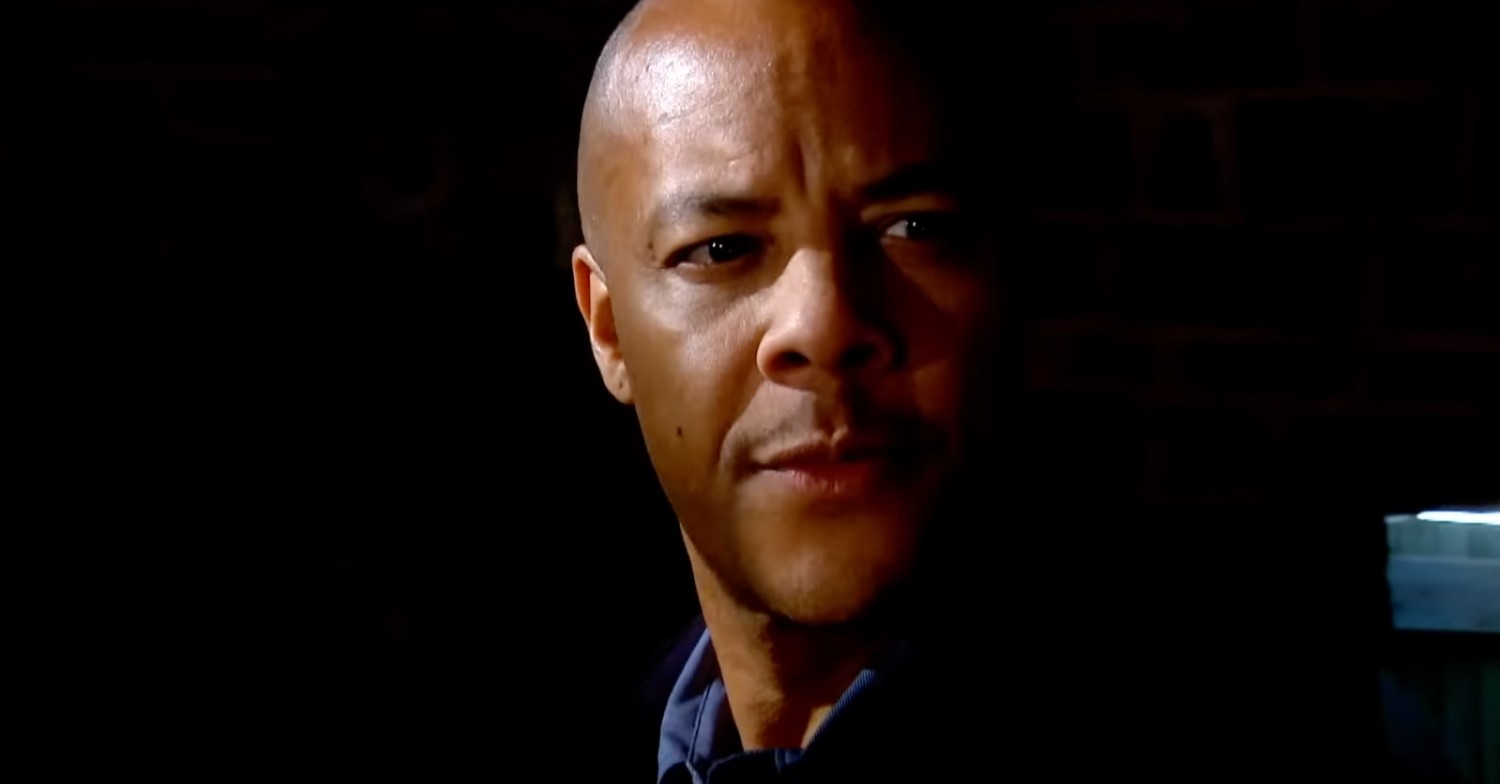 Emmerdale's Al against a dark background looking worried