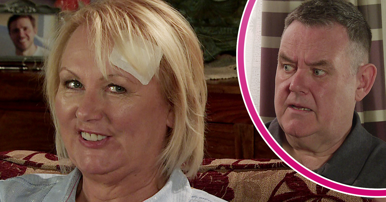 Coronation Street Eileen smiling with a plaster on her head and George looking at her concerned