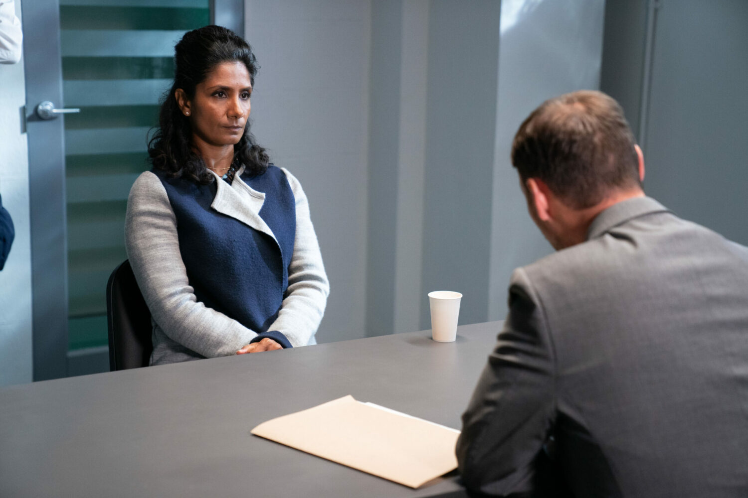 Suki Panesar being questioned at the station