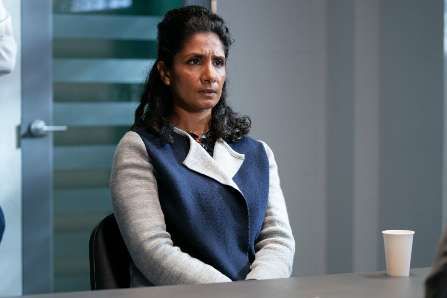 EastEnders Suki looking worried whilst being questioned